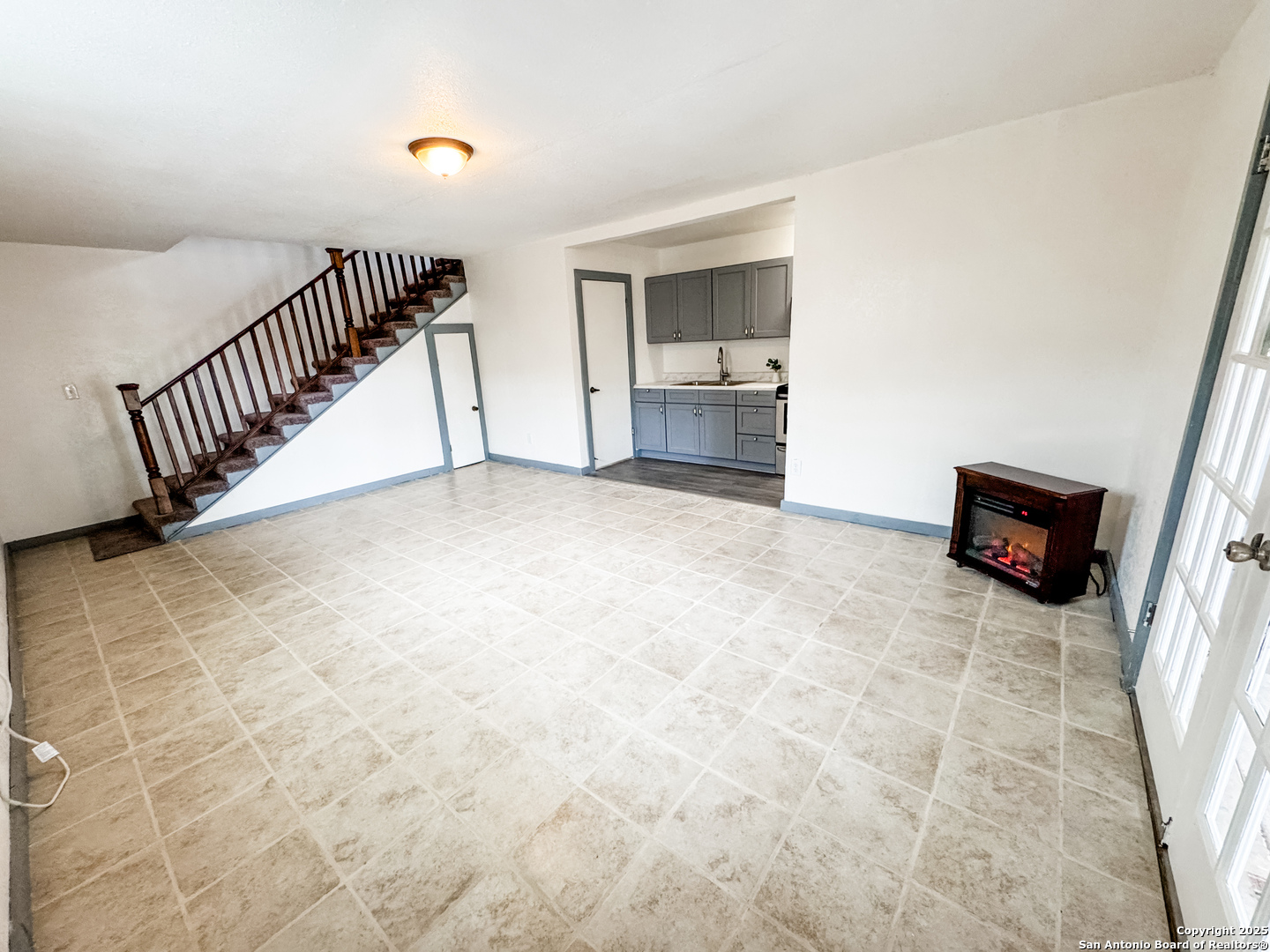 205 Plaza Navarra Road Brackettville, TX 78832 - Photo 7 of 21 a view of a livingroom with a staircase