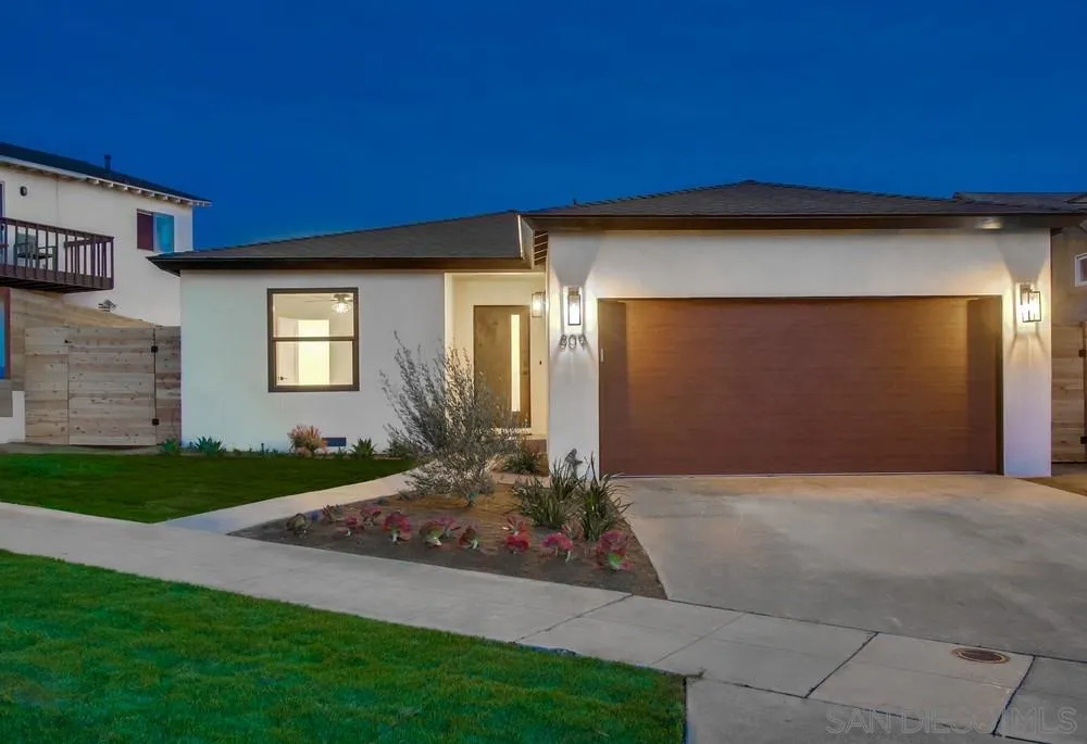809 Colima Street La Jolla, CA 92037 - Photo 3 of 25 a front view of a house with a yard