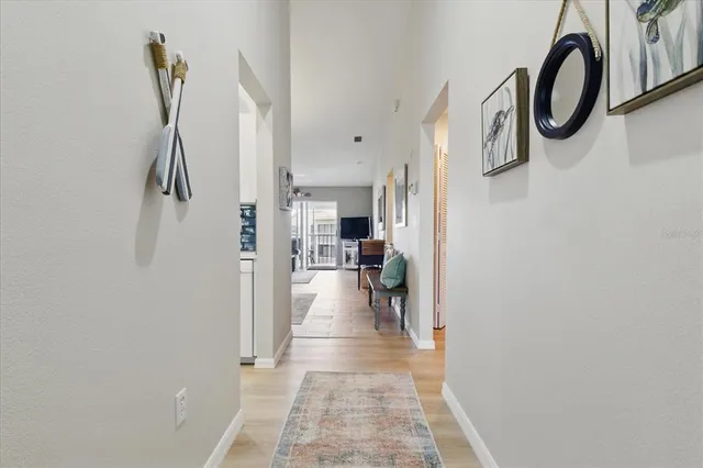 a view of a hallway with a furniture