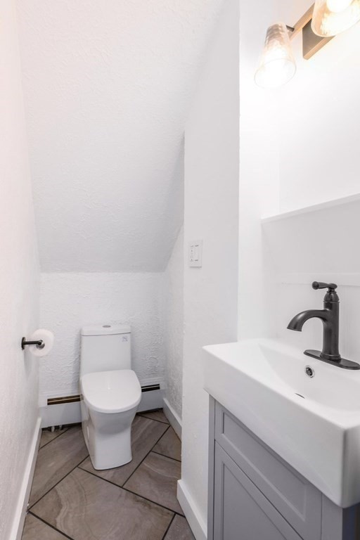 370 Thompson Road Webster, MA 01570 - Photo 40 of 42 a bathroom with a sink and a toilet