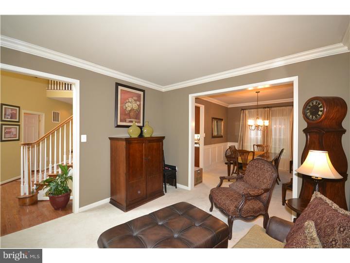 213 Barnhill Road Perkasie, PA 18944 - Photo 12 of 25 a living room with furniture and wooden floor
