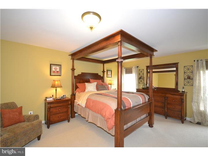 213 Barnhill Road Perkasie, PA 18944 - Photo 16 of 25 a bedroom with a bed and dresser