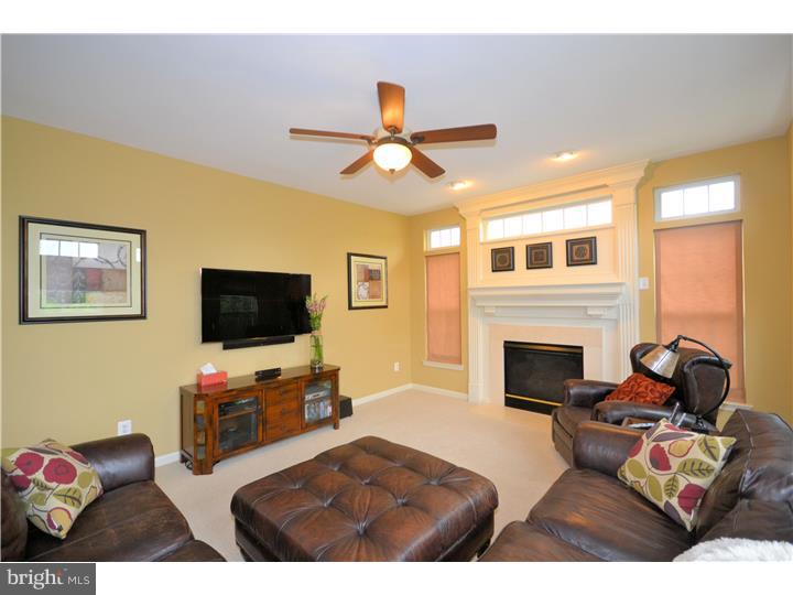 213 Barnhill Road Perkasie, PA 18944 - Photo 10 of 25 a living room with furniture and a flat screen tv