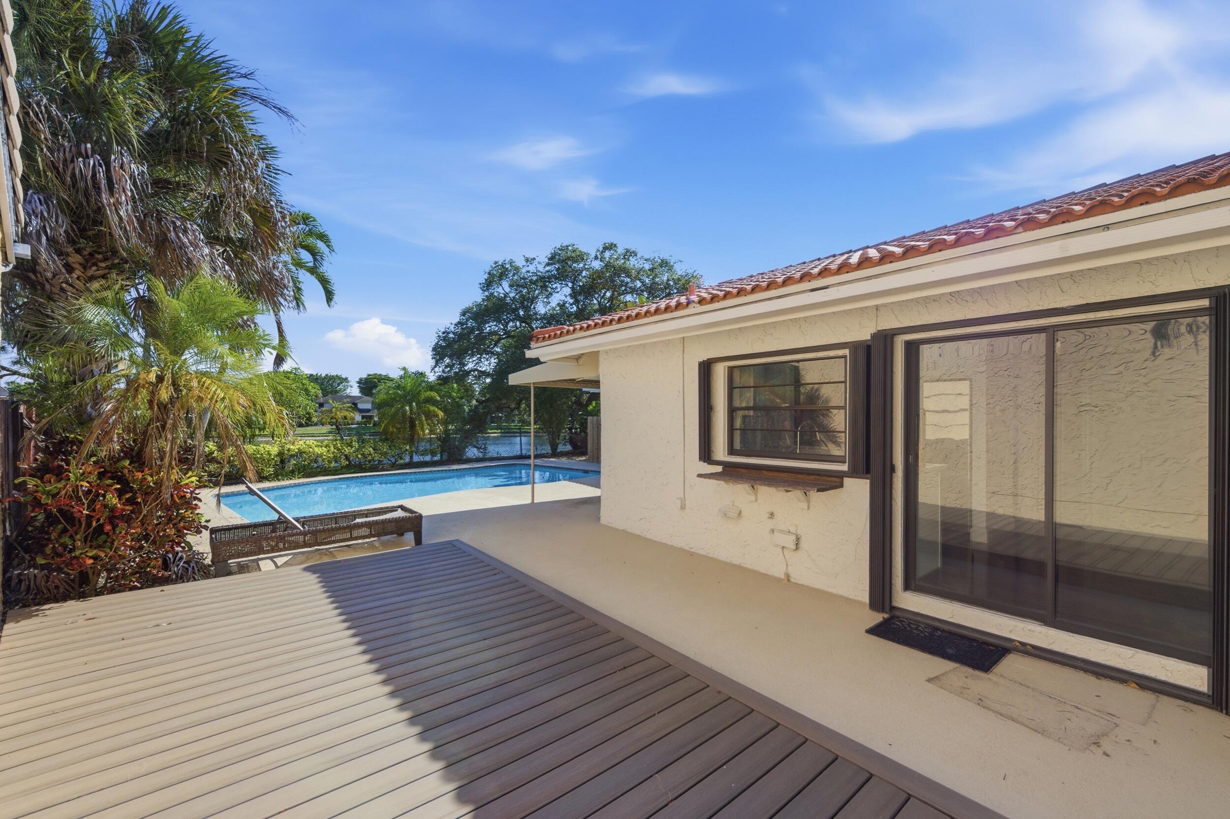 6488 Pond Apple Road Boca Raton, FL 33433 - Photo 22 of 28 side patio lakeview