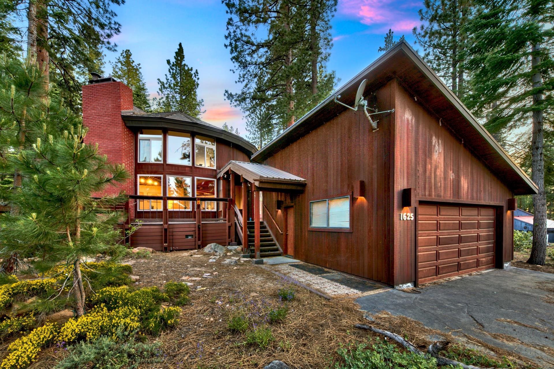 1625 Deer Path Truckee, CA 96161 - Photo 1 of 28 a front view of a house with garden