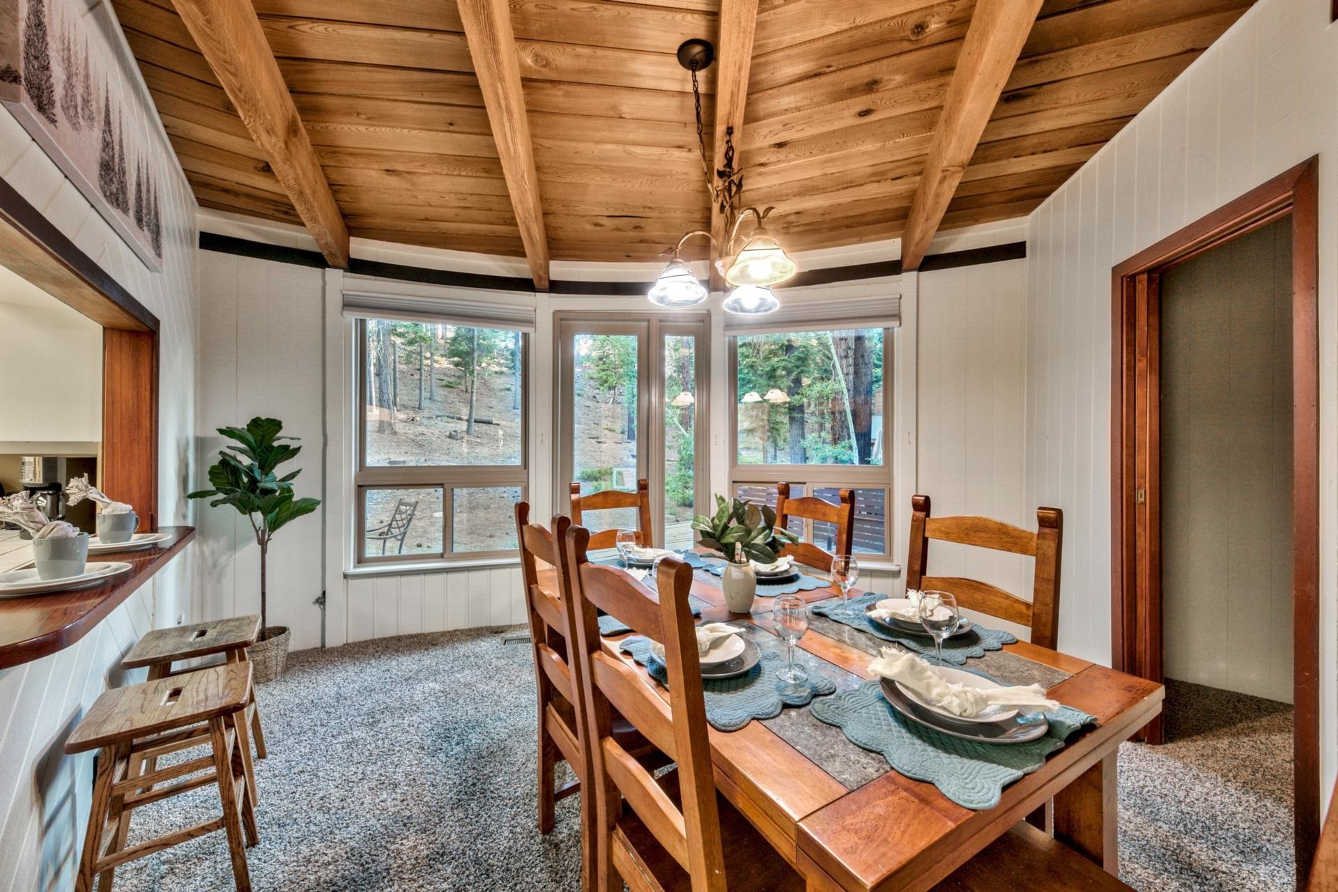 1625 Deer Path Truckee, CA 96161 - Photo 14 of 28 a living room with furniture and a floor to ceiling window