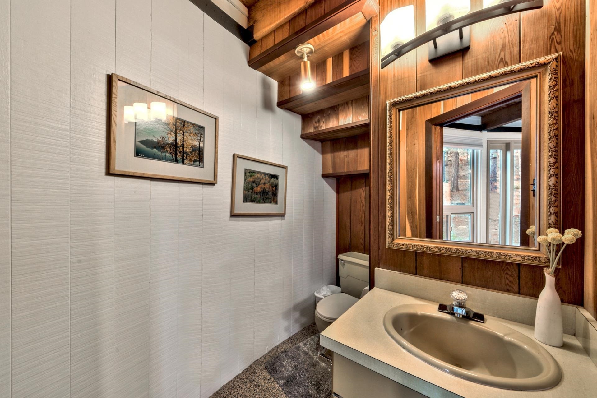 1625 Deer Path Truckee, CA 96161 - Photo 19 of 28 a bathroom with a sink and a mirror