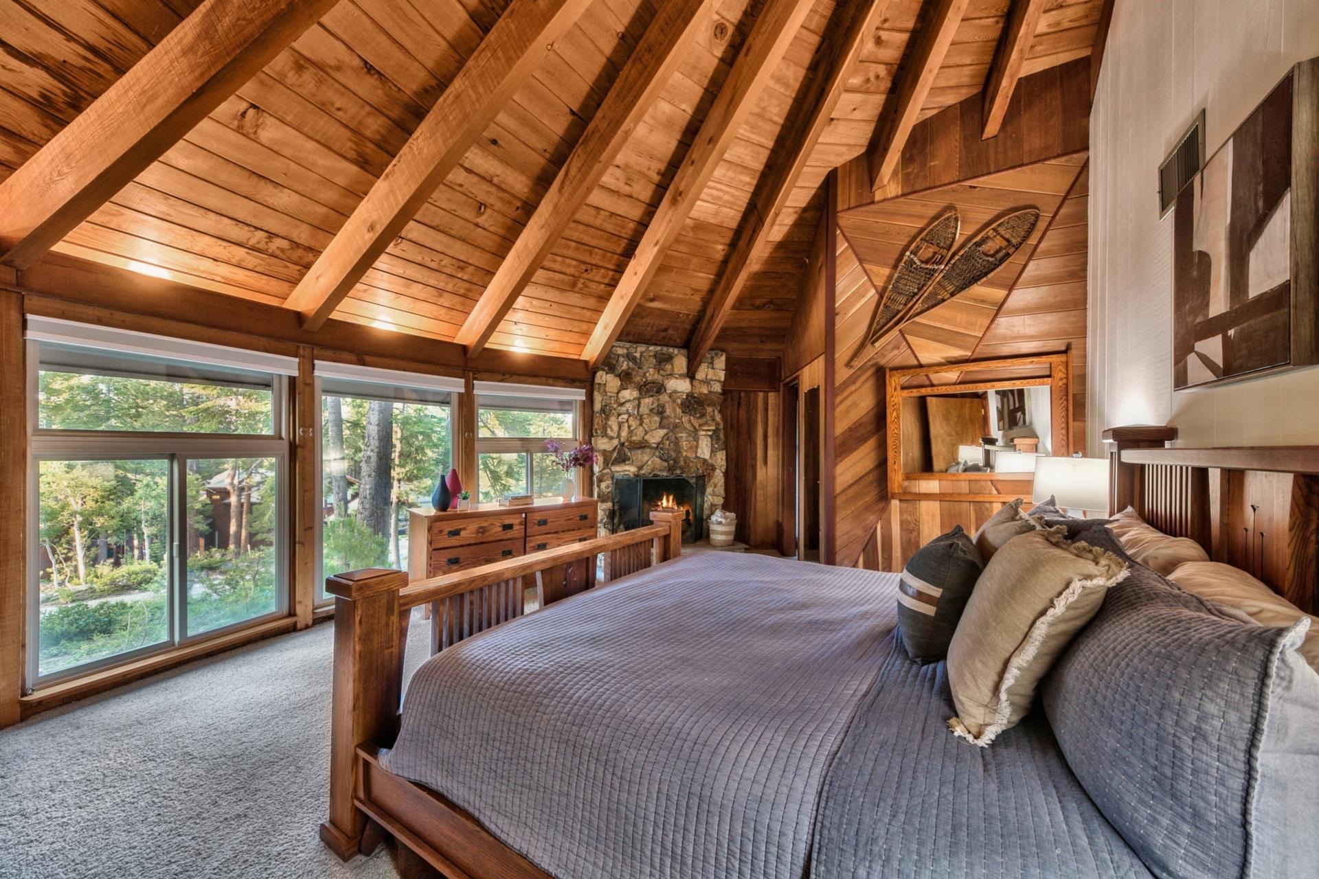 1625 Deer Path Truckee, CA 96161 - Photo 20 of 28 a bed sitting in a bedroom next to a large window