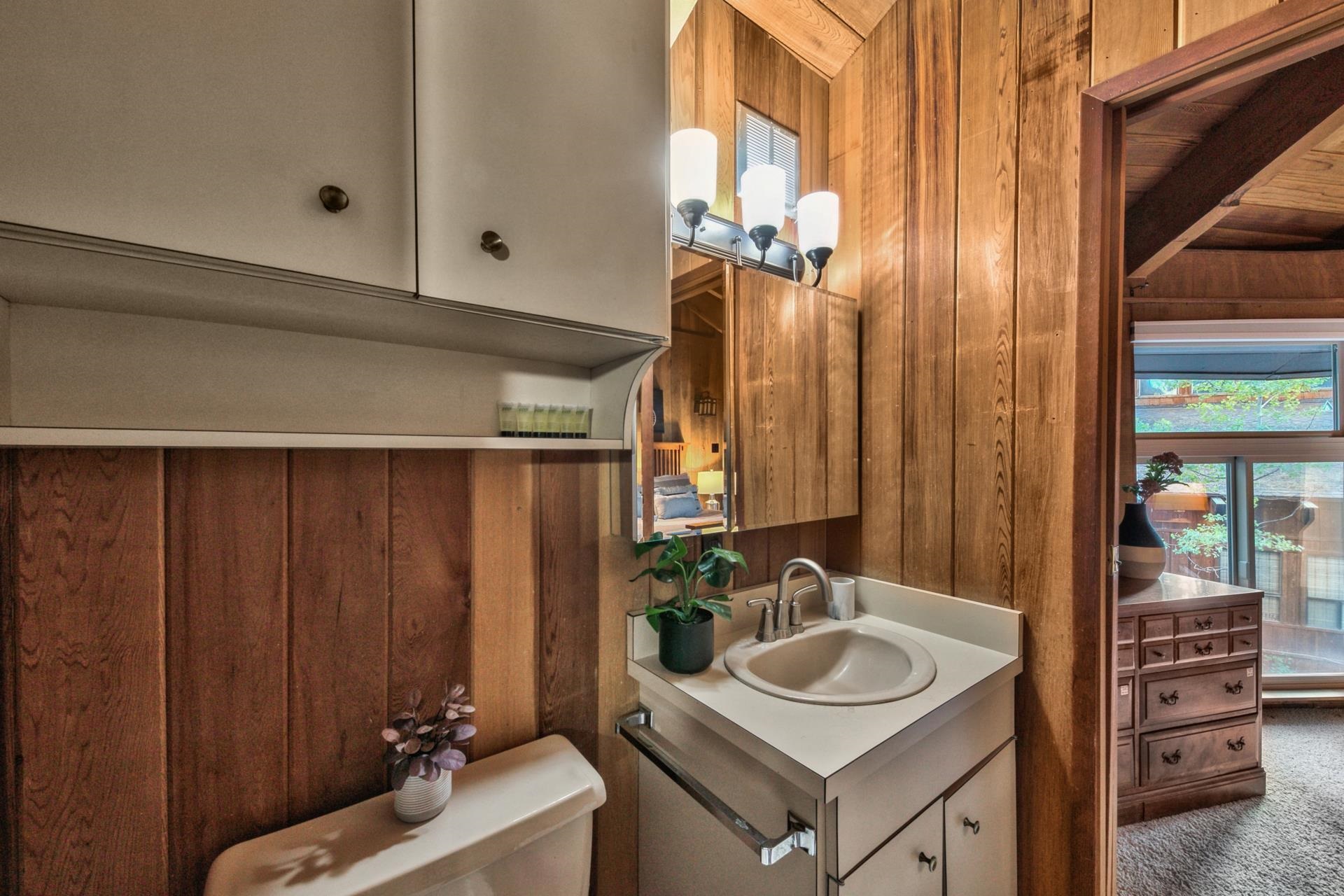 1625 Deer Path Truckee, CA 96161 - Photo 23 of 28 a bathroom with a sink vanity granite tub and shower