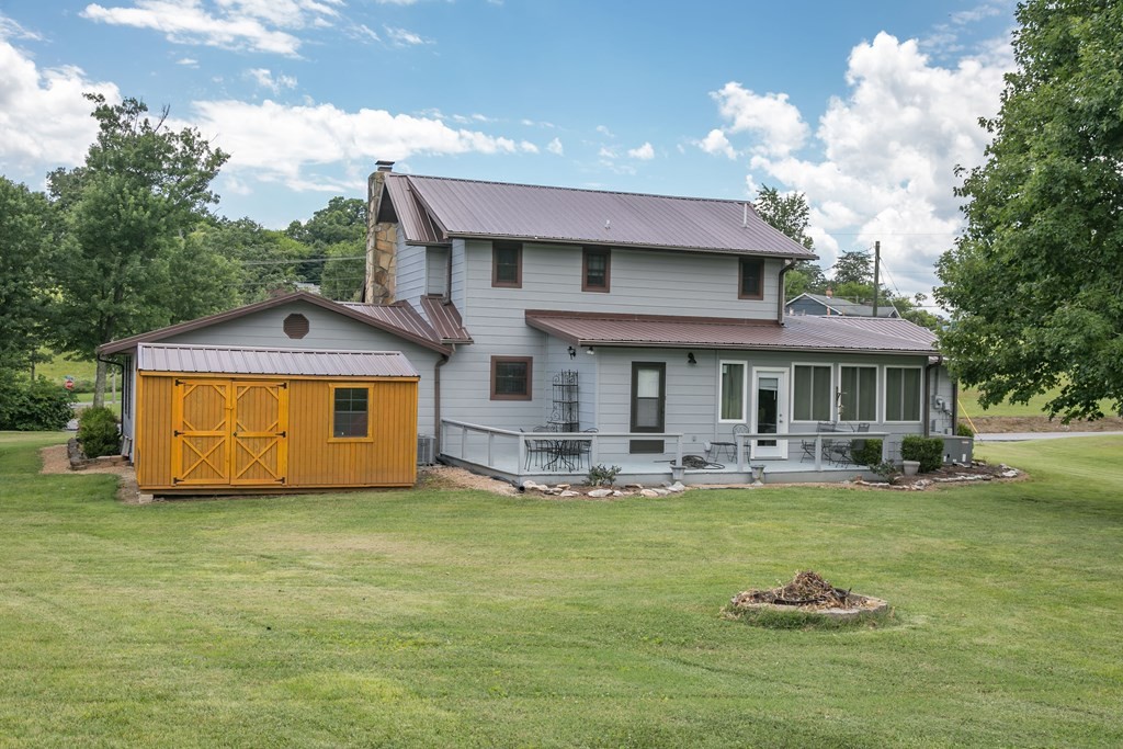 3108 Fortenberry Road Kodak, TN 37764 - Photo 42 of 47 a front view of a house with garden
