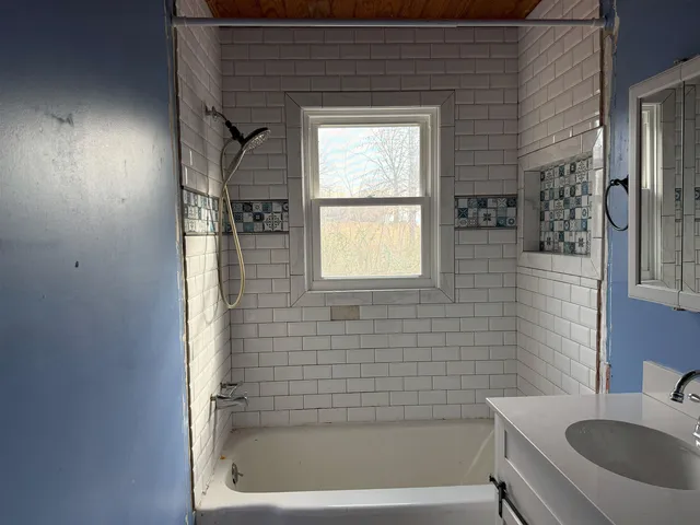 a room with furniture and a window