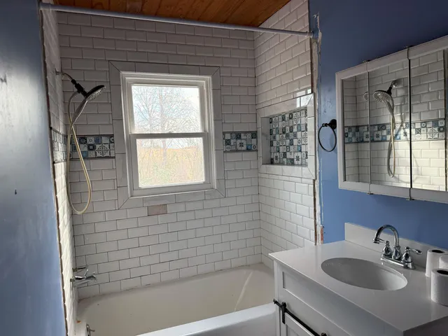 a room with furniture and a wooden floor