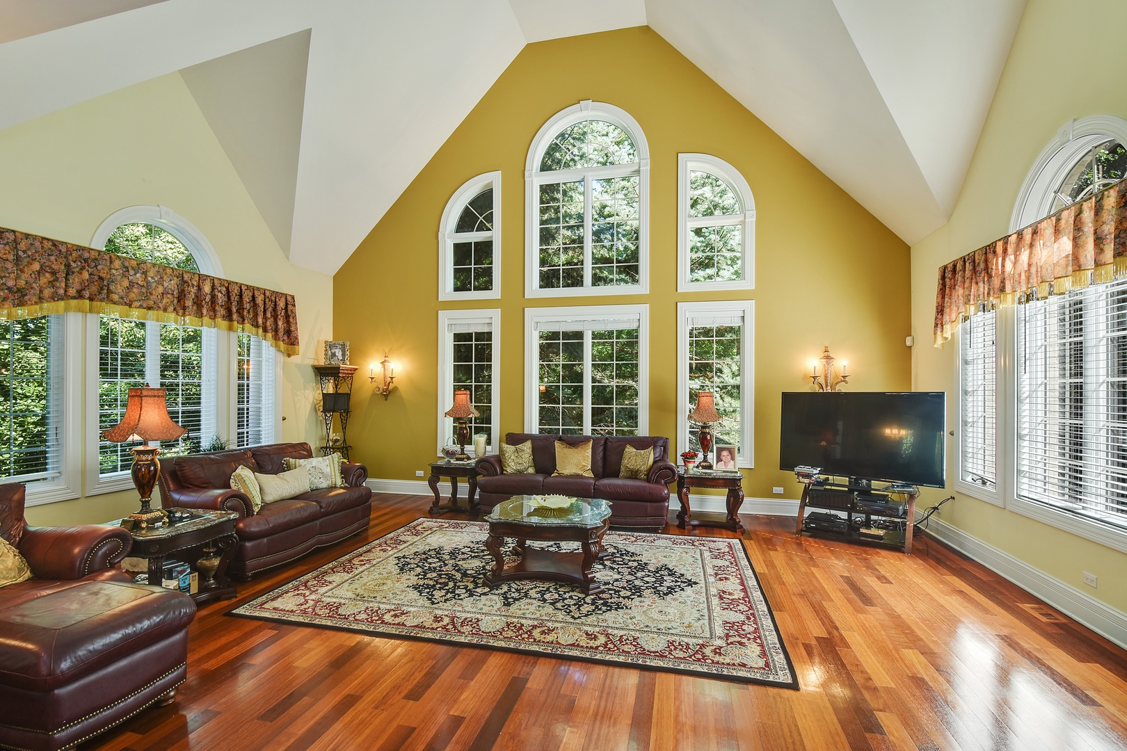 595 Plum Tree Road Barrington Hills, IL 60010 - Photo 13 of 46 a living room with furniture and a flat screen tv