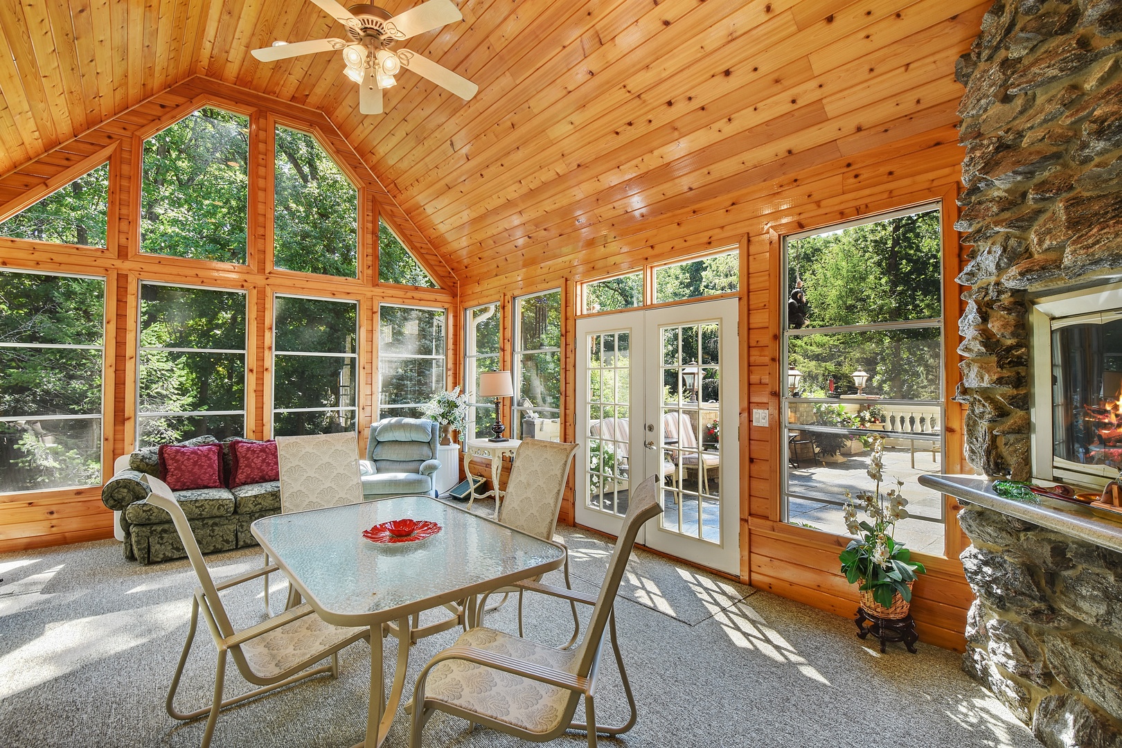 595 Plum Tree Road Barrington Hills, IL 60010 - Photo 16 of 46 a living room with furniture and a floor to ceiling window