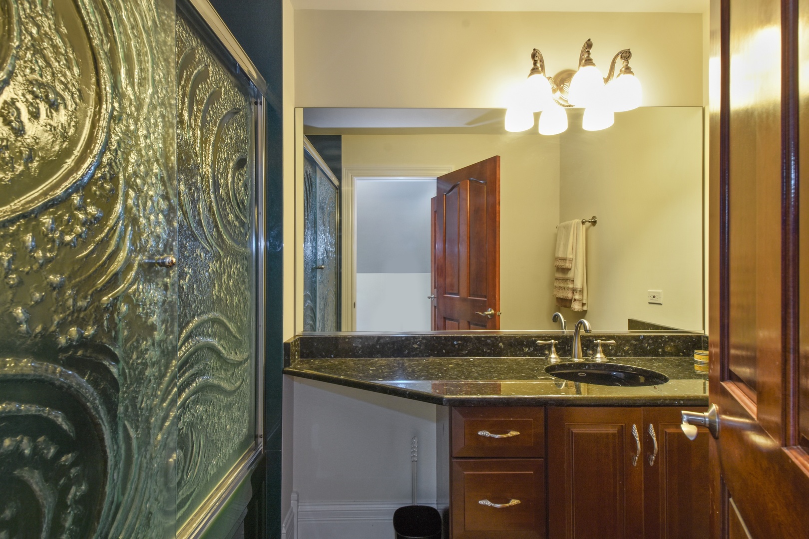 595 Plum Tree Road Barrington Hills, IL 60010 - Photo 24 of 46 a bathroom with a granite countertop sink and a mirror