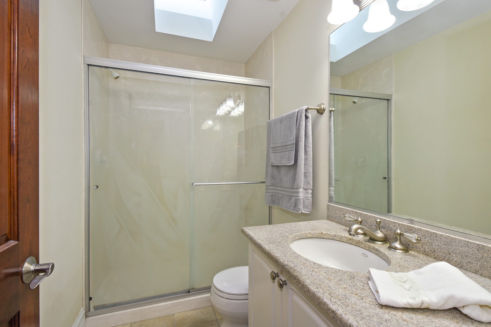 595 Plum Tree Road Barrington Hills, IL 60010 - Photo 26 of 46 a bathroom with a granite countertop sink toilet and shower