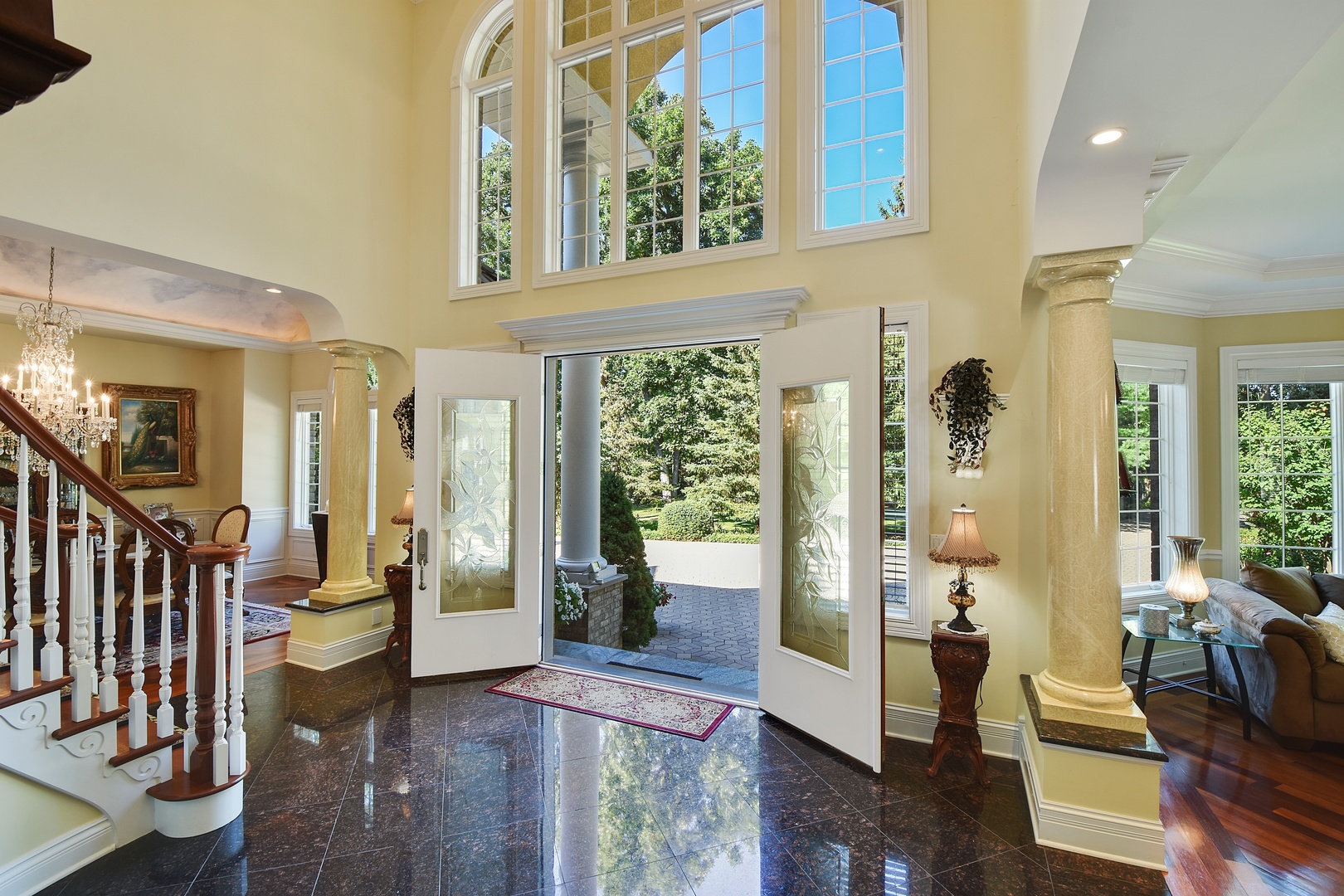 595 Plum Tree Road Barrington Hills, IL 60010 - Photo 4 of 46 a living room with furniture and a large window