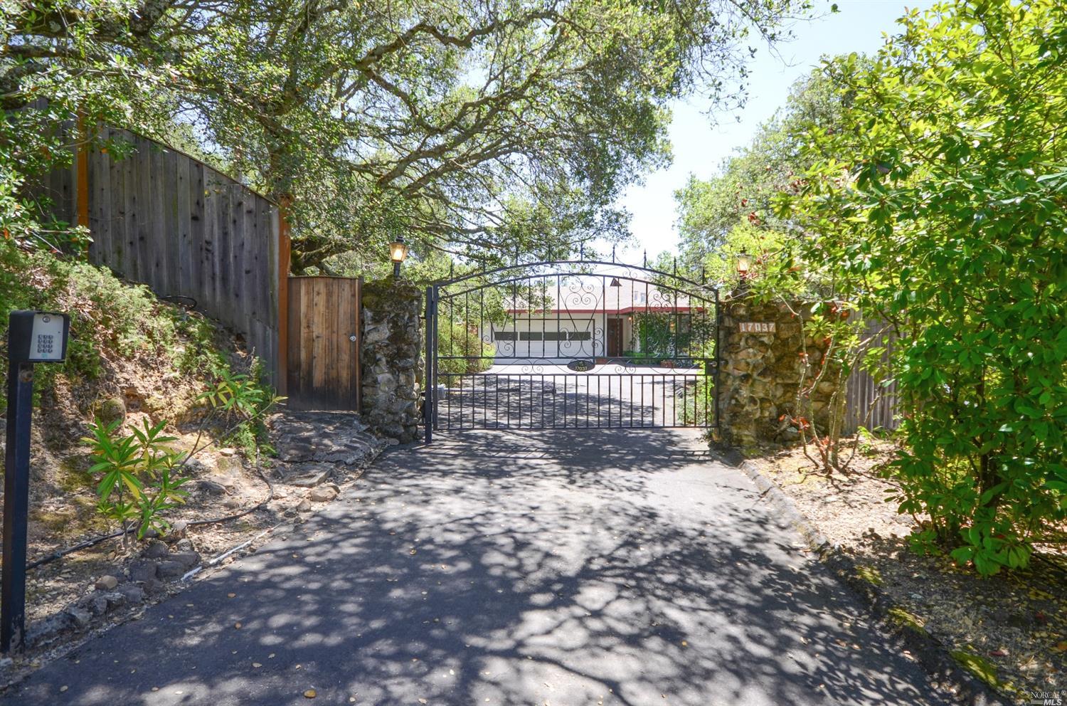 17037 High Road Sonoma, CA 95476 - Photo 1 of 1 a view of a small yard and wooden fence