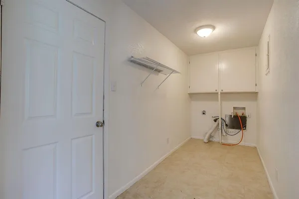 an empty room that has a window