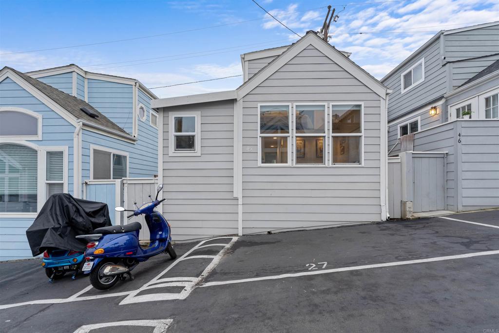 1624 North Coast Highway 101, Unit 45 Encinitas, CA 92024 - Photo 29 of 37 a car parked in front of a house