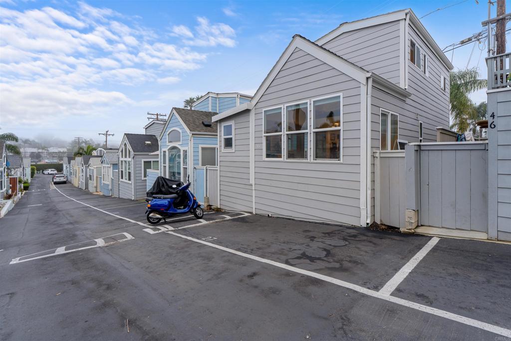 1624 North Coast Highway 101, Unit 45 Encinitas, CA 92024 - Photo 30 of 37 a view of a house with a patio