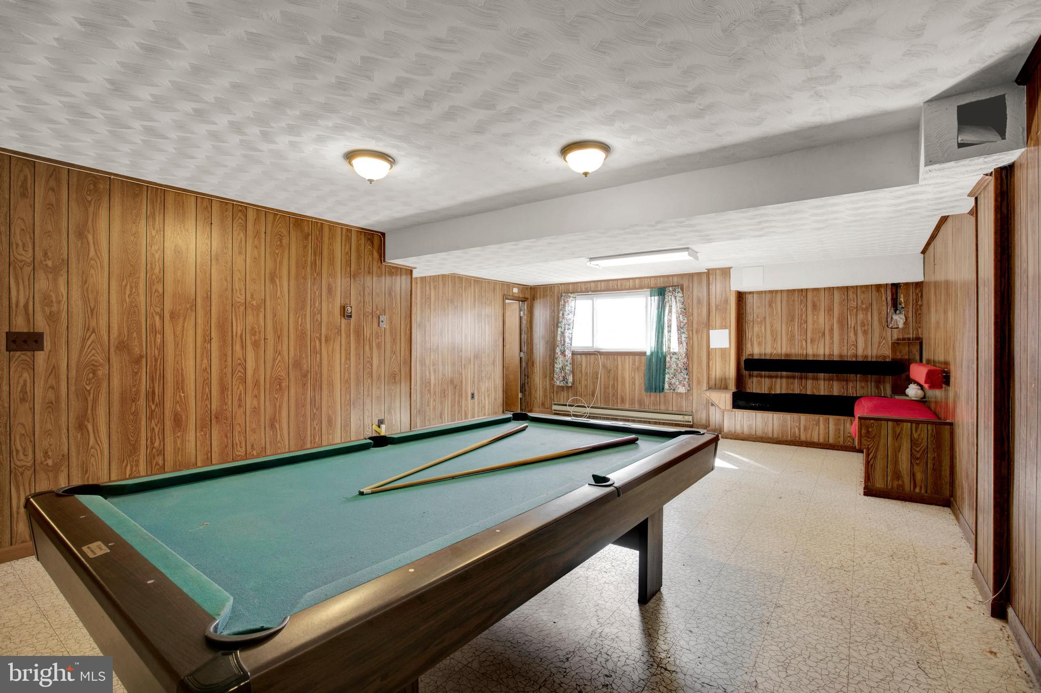 6811 Coolridge Road Temple Hills, MD 20748 - Photo 35 of 56 Lower level rec room
