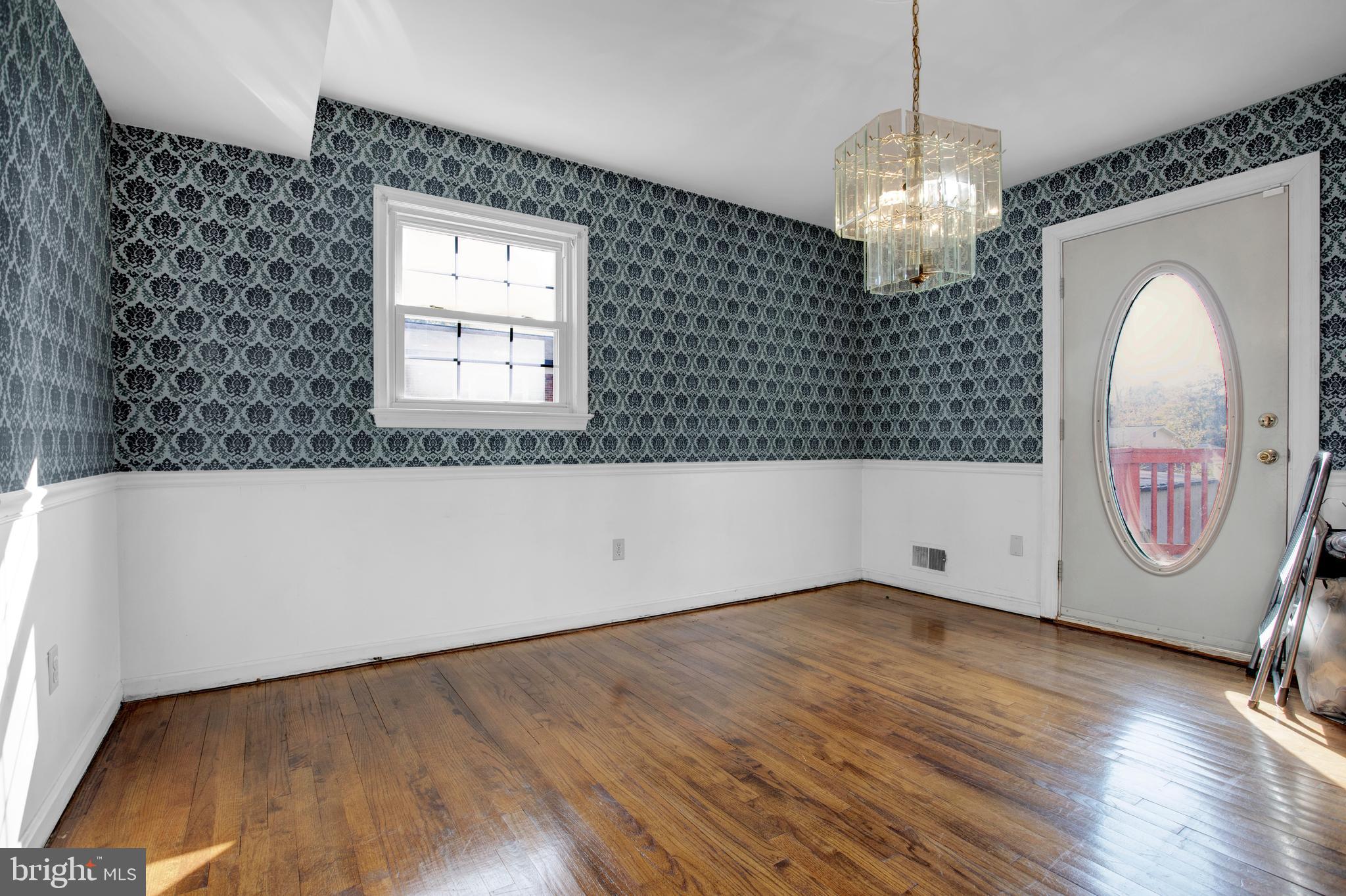6811 Coolridge Road Temple Hills, MD 20748 - Photo 5 of 56 Dining Room w/ door leading to back deck