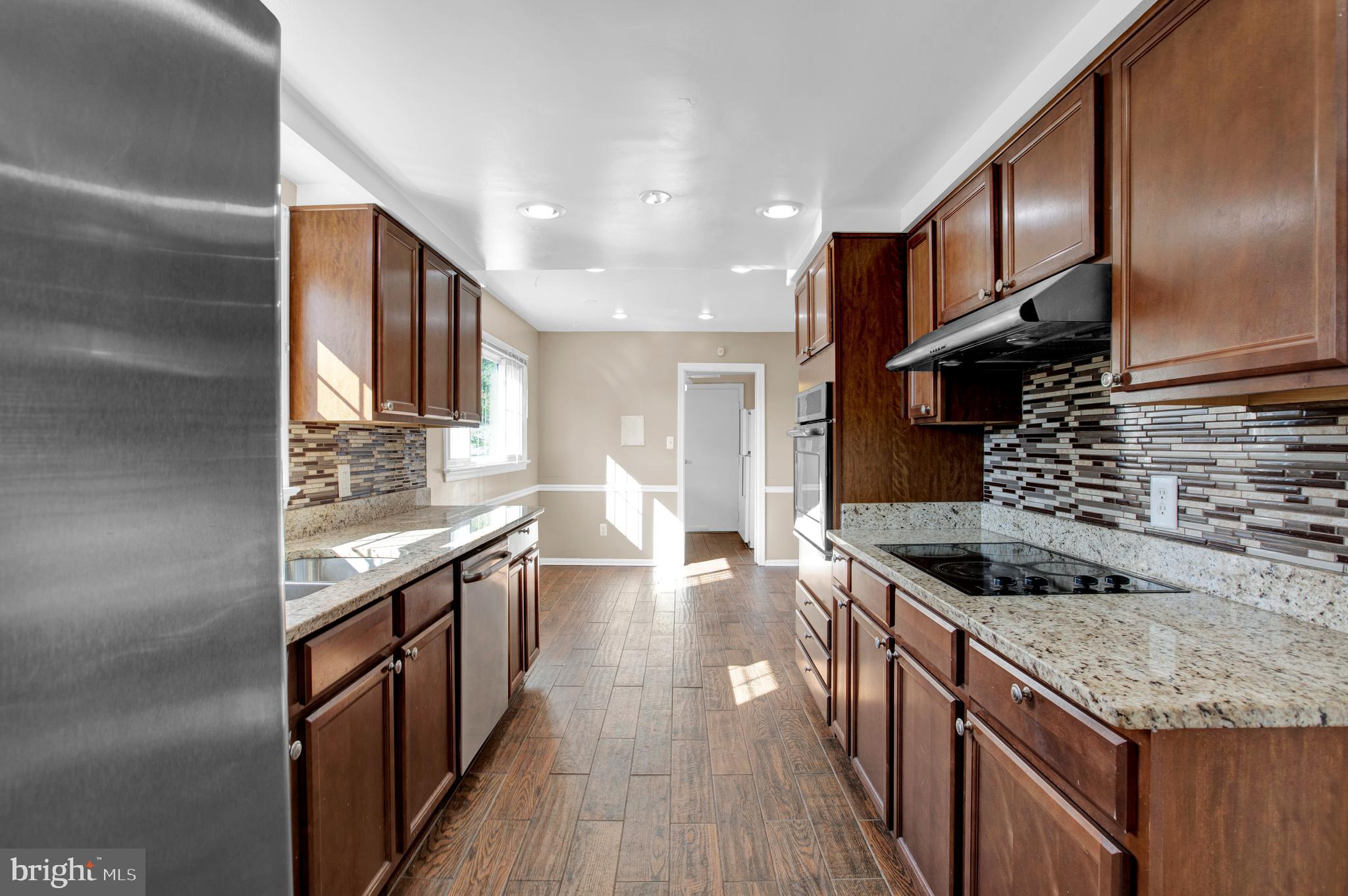 6811 Coolridge Road Temple Hills, MD 20748 - Photo 7 of 56 Kitchen view from DR