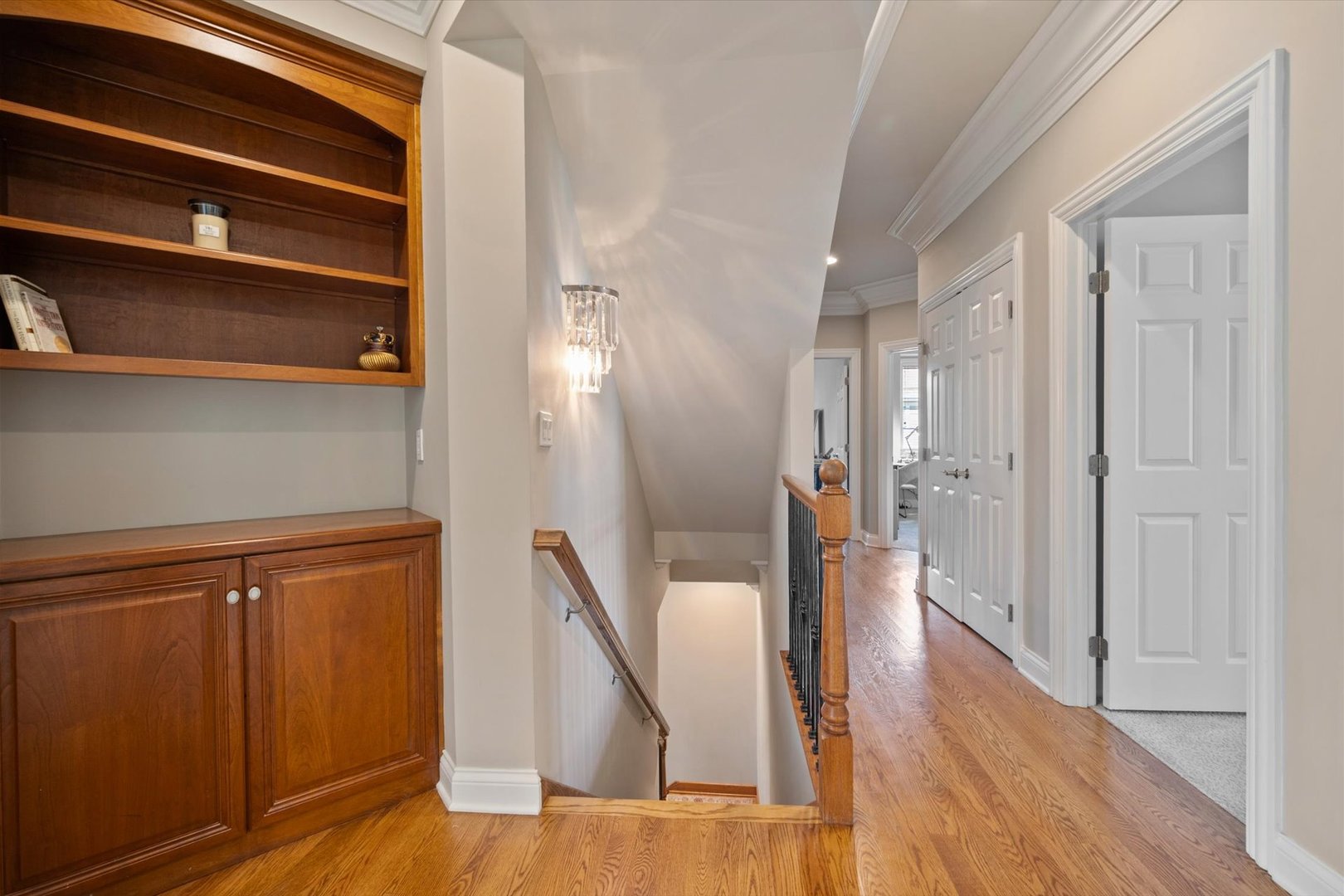 39W821 South Hathaway Lane Geneva, IL 60134 - Photo 19 of 54 a view of a hallway with wooden floor and staircase