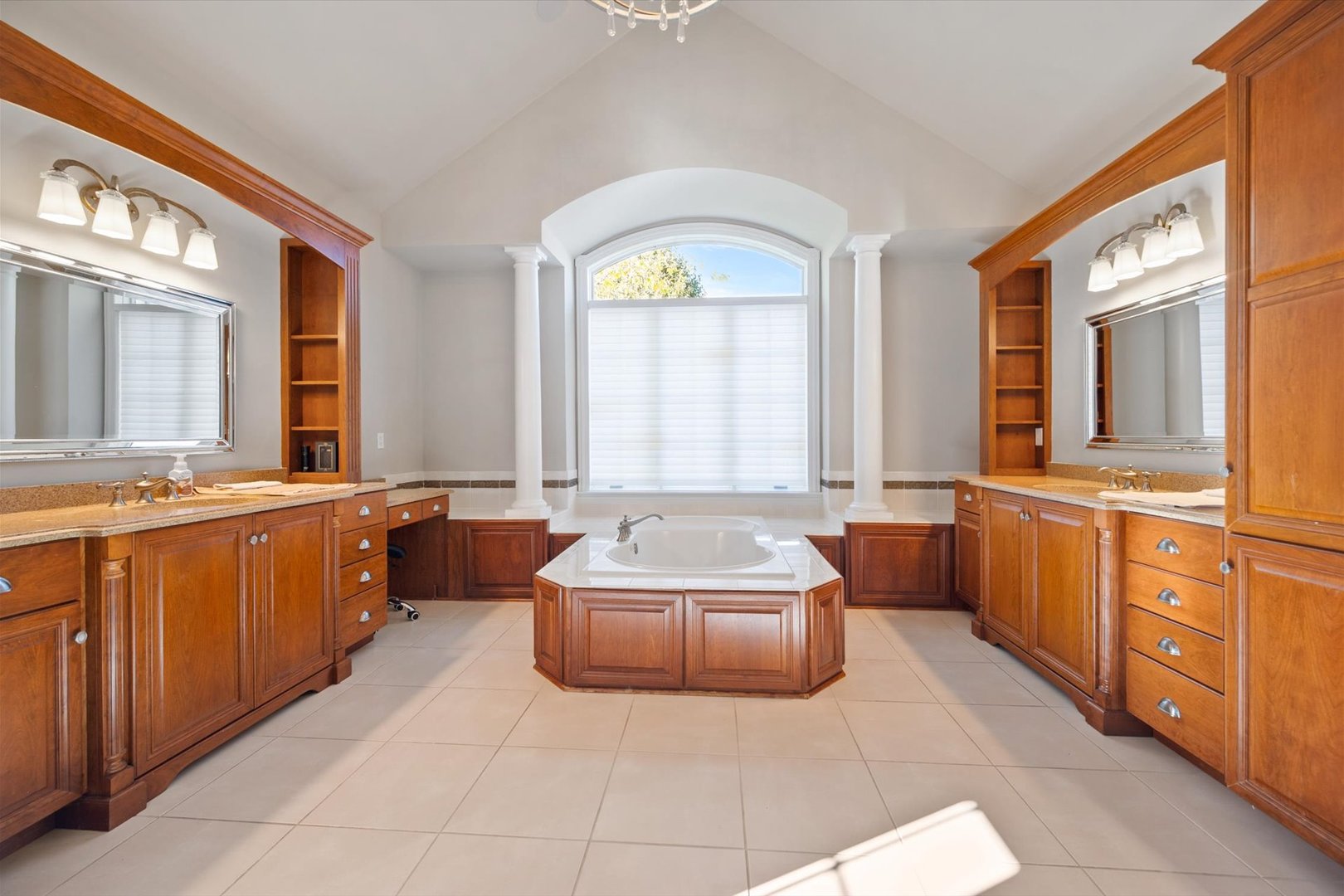 39W821 South Hathaway Lane Geneva, IL 60134 - Photo 22 of 54 a spacious bathroom with a tub a double vanity sink a window and mirror