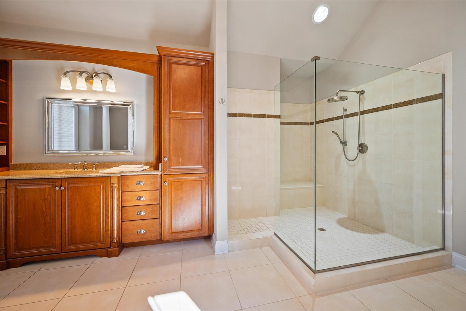 39W821 South Hathaway Lane Geneva, IL 60134 - Photo 23 of 54 a bathroom with a granite countertop sink mirror and shower