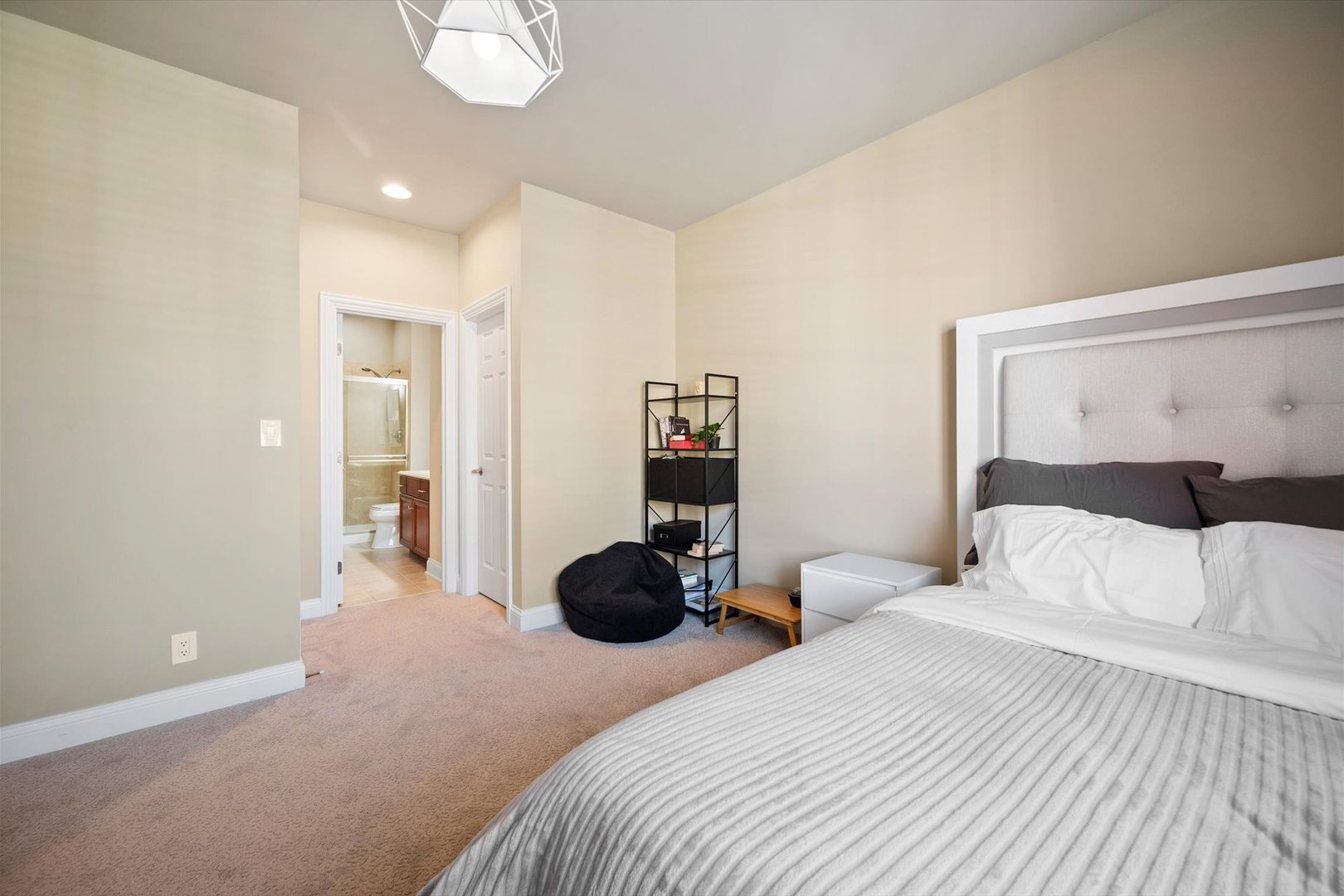 39W821 South Hathaway Lane Geneva, IL 60134 - Photo 26 of 54 a bedroom with a bed and cabinets