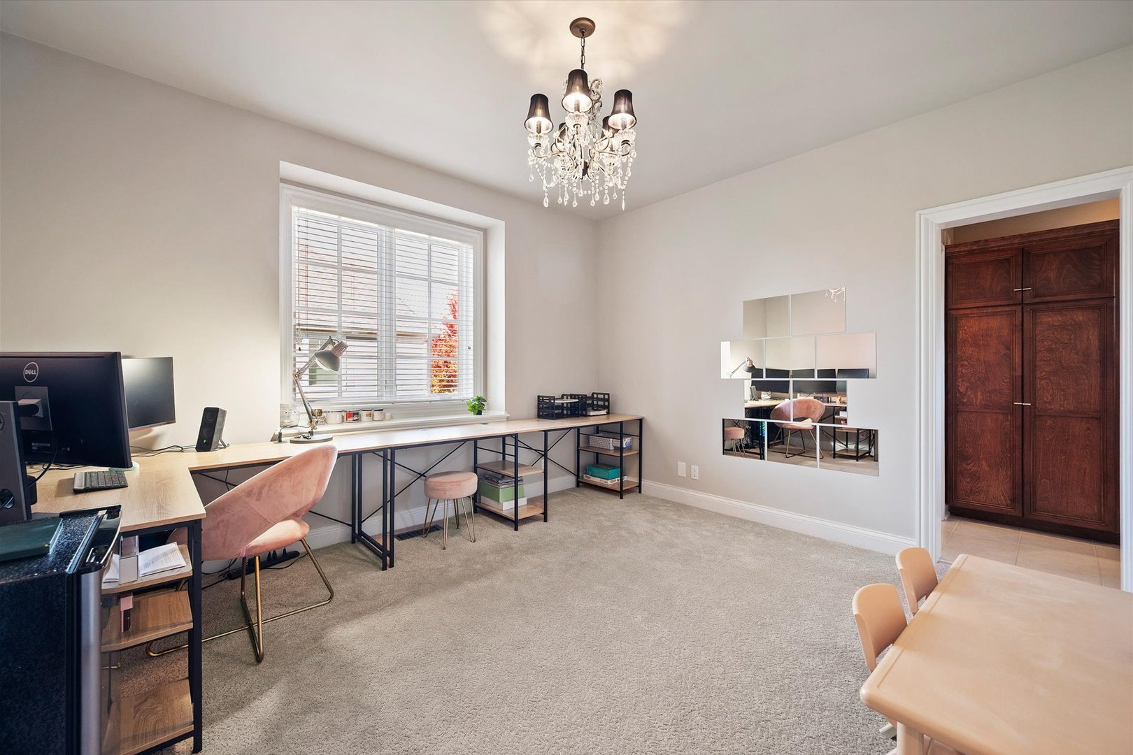 39W821 South Hathaway Lane Geneva, IL 60134 - Photo 28 of 54 a living room with furniture and a flat screen tv