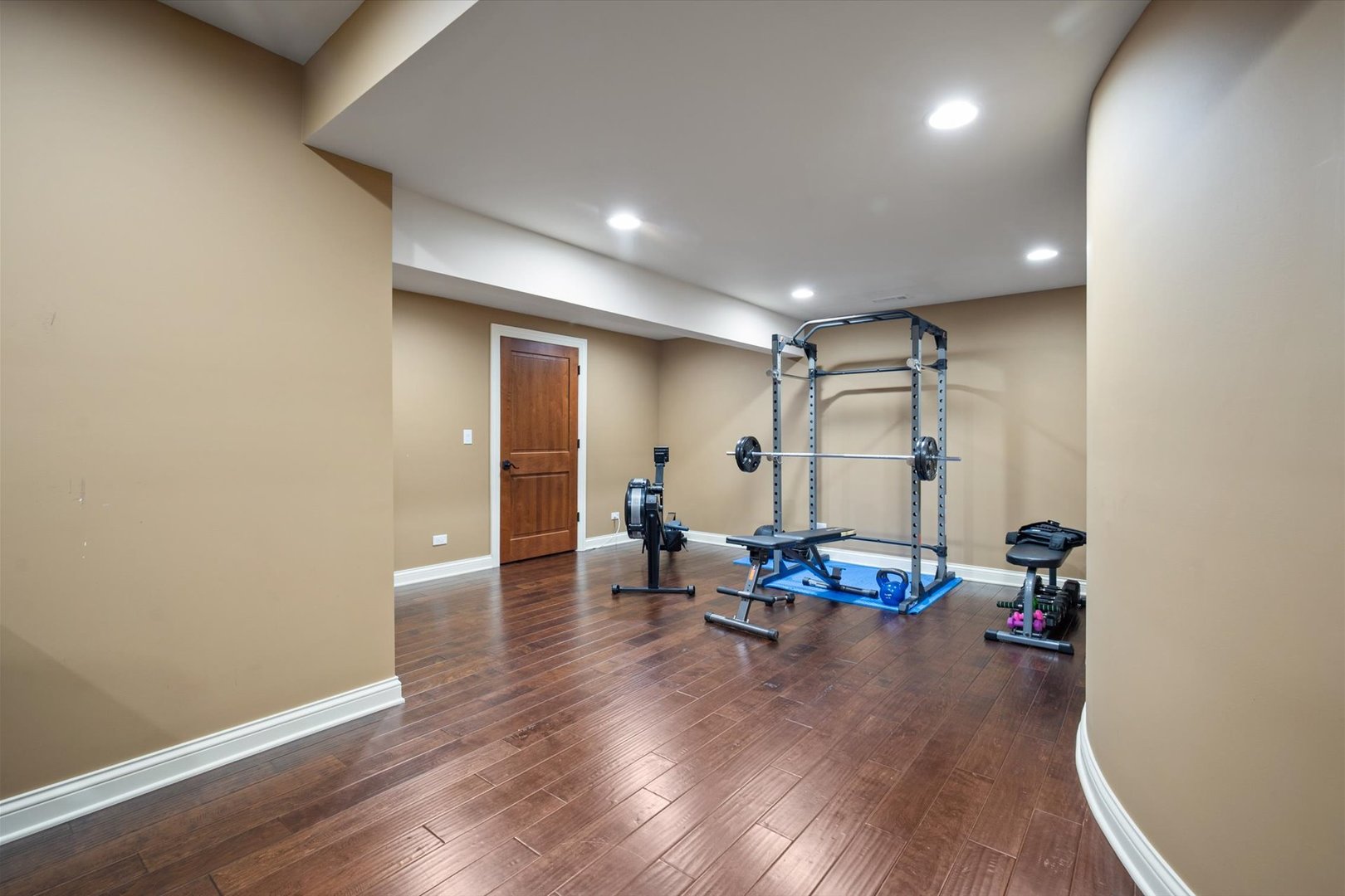 39W821 South Hathaway Lane Geneva, IL 60134 - Photo 40 of 54 a hallway with wooden floor and furniture