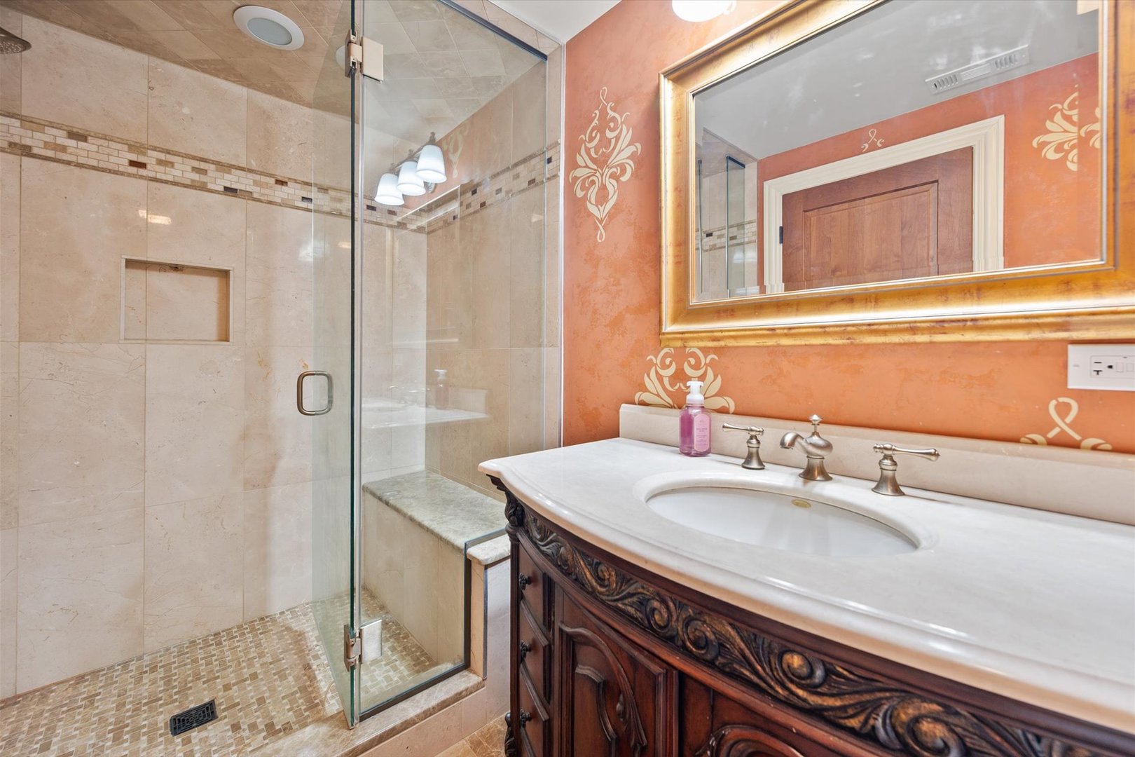 39W821 South Hathaway Lane Geneva, IL 60134 - Photo 44 of 54 a bathroom with a sink a mirror and a shower