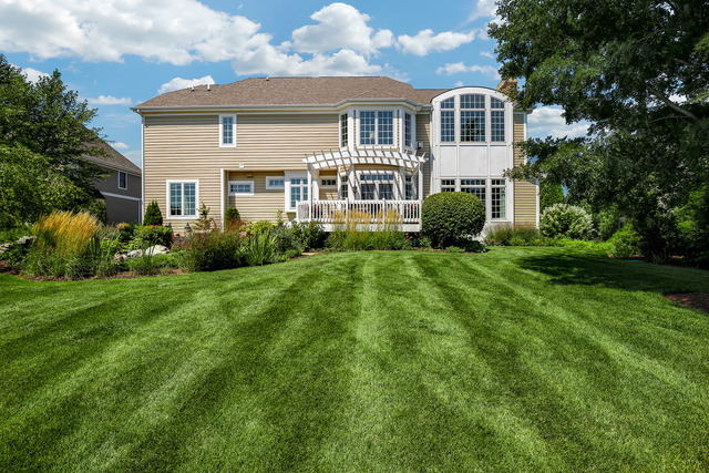39W821 South Hathaway Lane Geneva, IL 60134 - Photo 49 of 54 a front view of a house with a yard