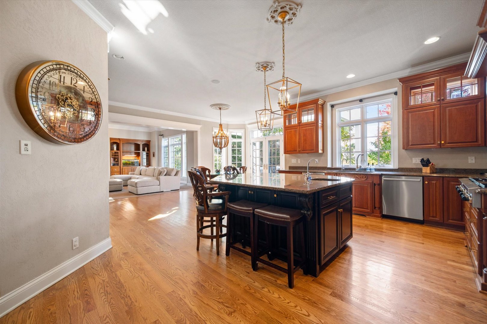 39W821 South Hathaway Lane Geneva, IL 60134 - Photo 10 of 54 a kitchen with a table chairs a sink dishwasher window and cabinets