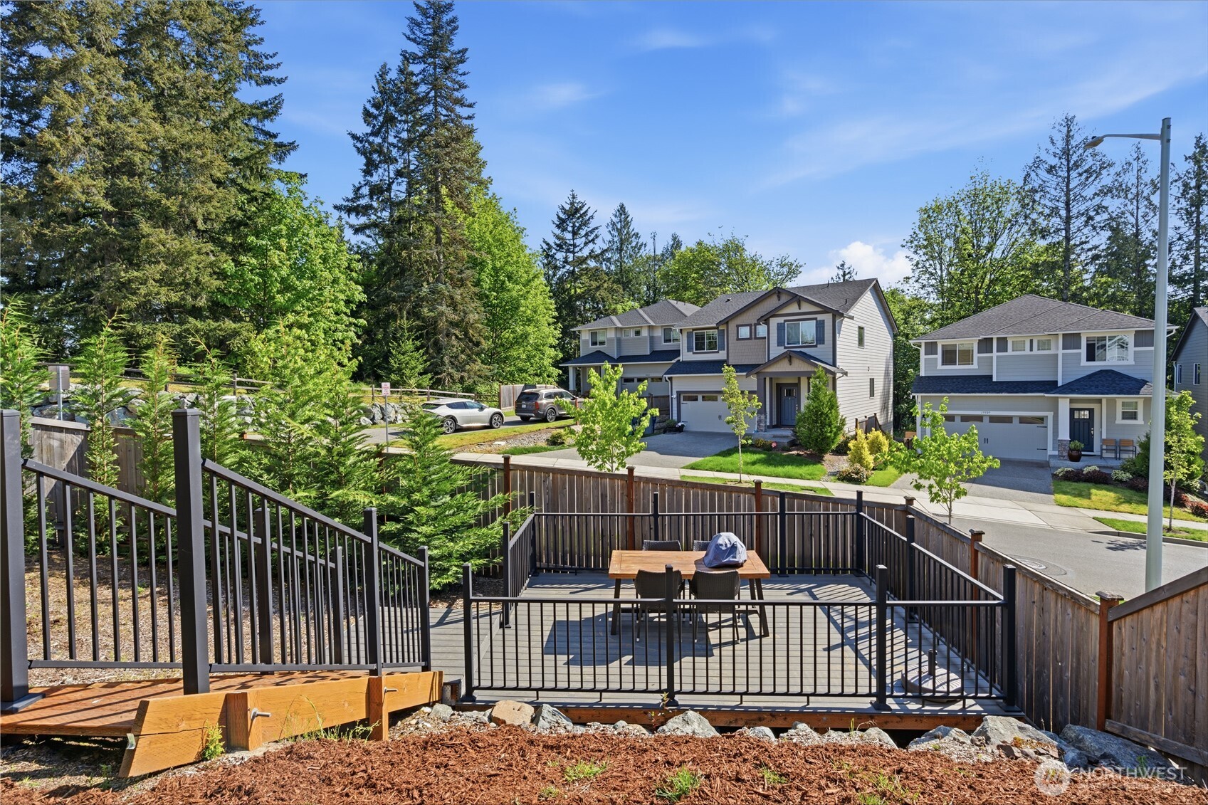19432 9th Avenue Southeast Bothell, WA 98012 - Photo 32 of 33 a view of a roof deck with wooden fence