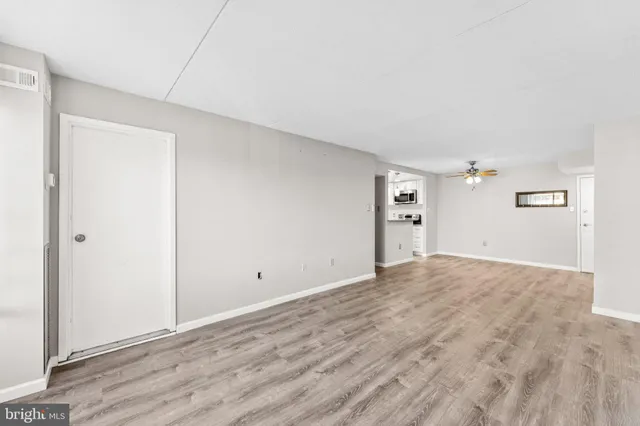 a view of kitchen with wooden floor