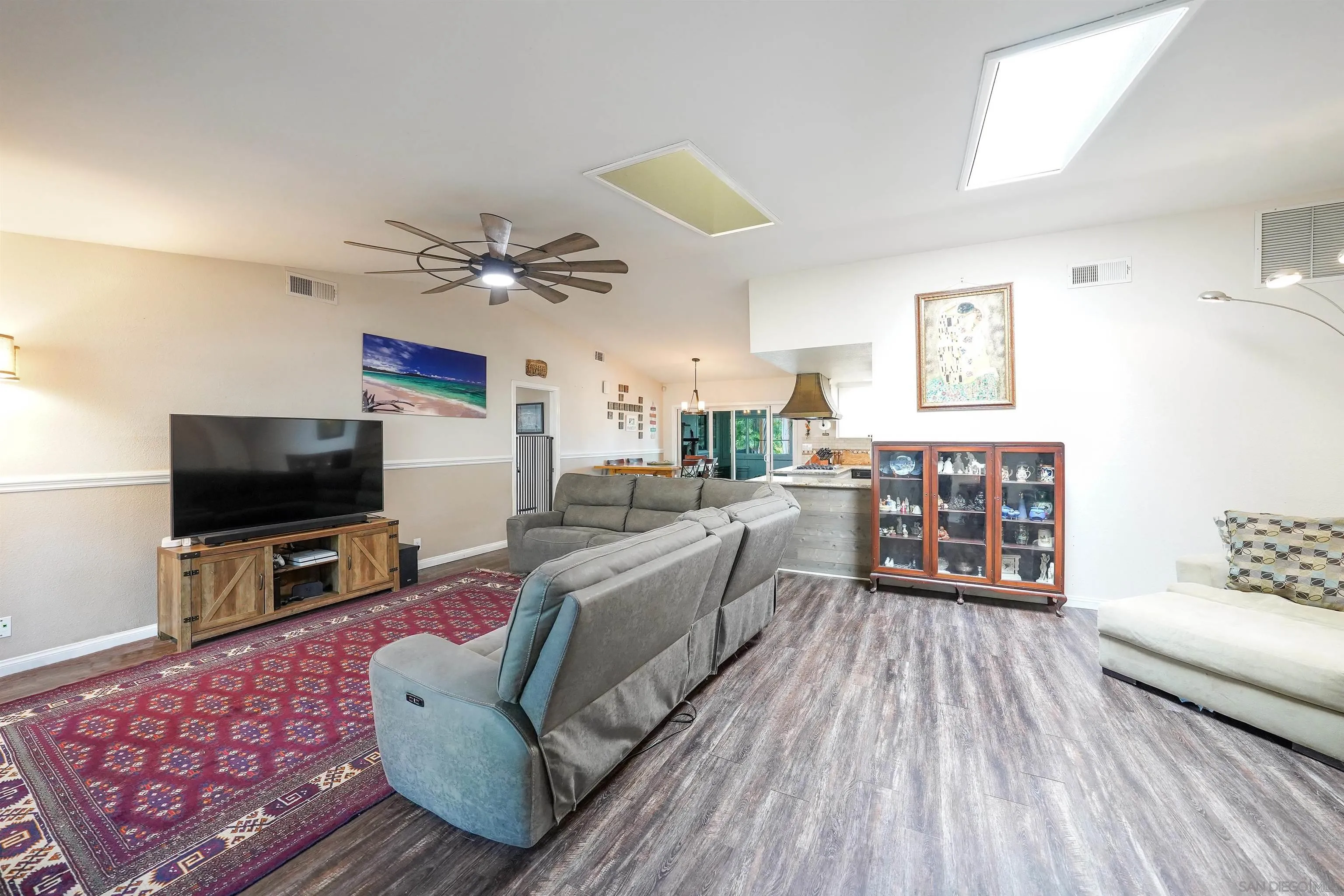 24563 Del Amo Road Ramona, CA 92065 - Photo 17 of 59 a living room with furniture and a flat screen tv