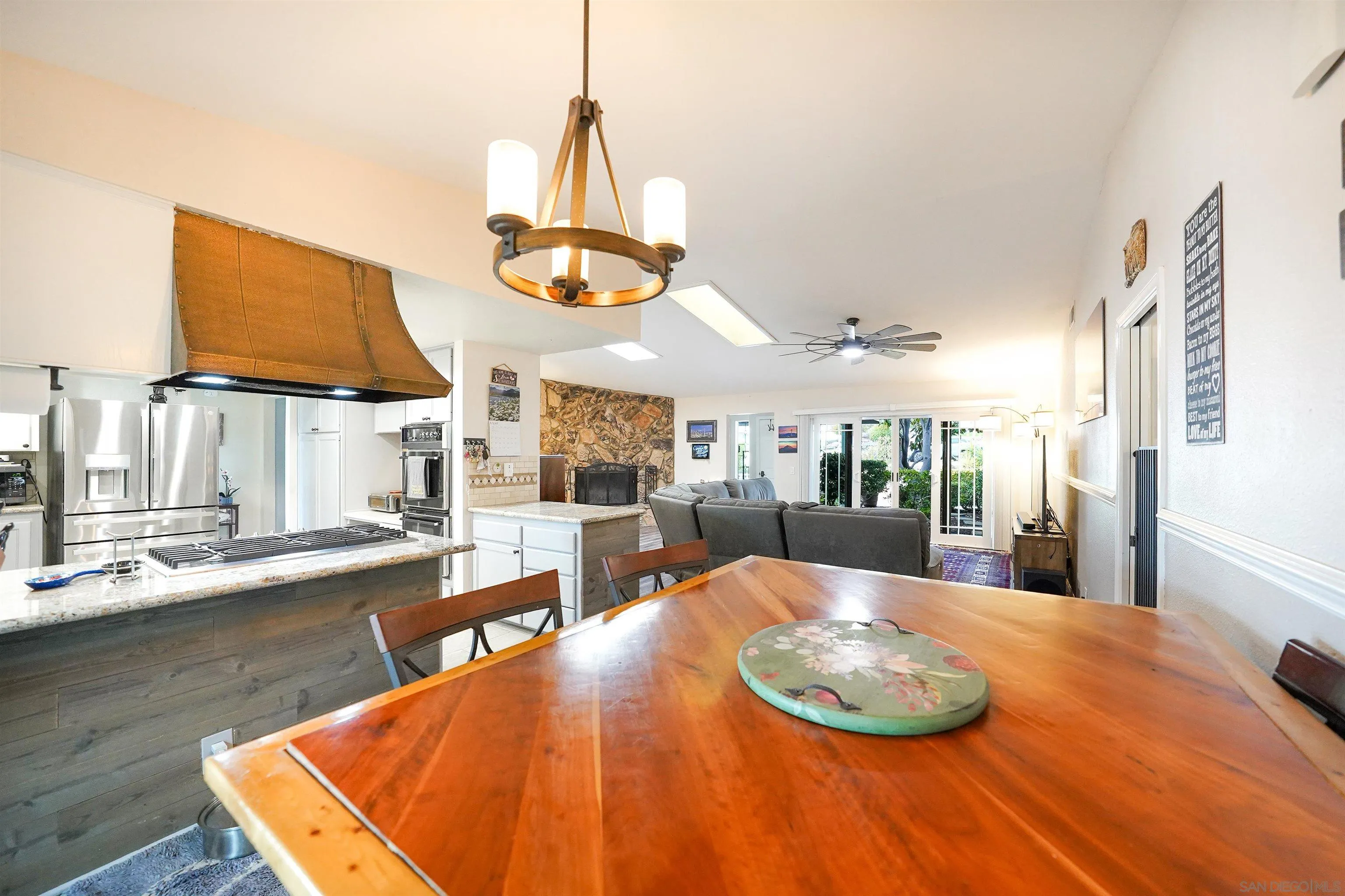24563 Del Amo Road Ramona, CA 92065 - Photo 23 of 59 a view of a dining room with furniture