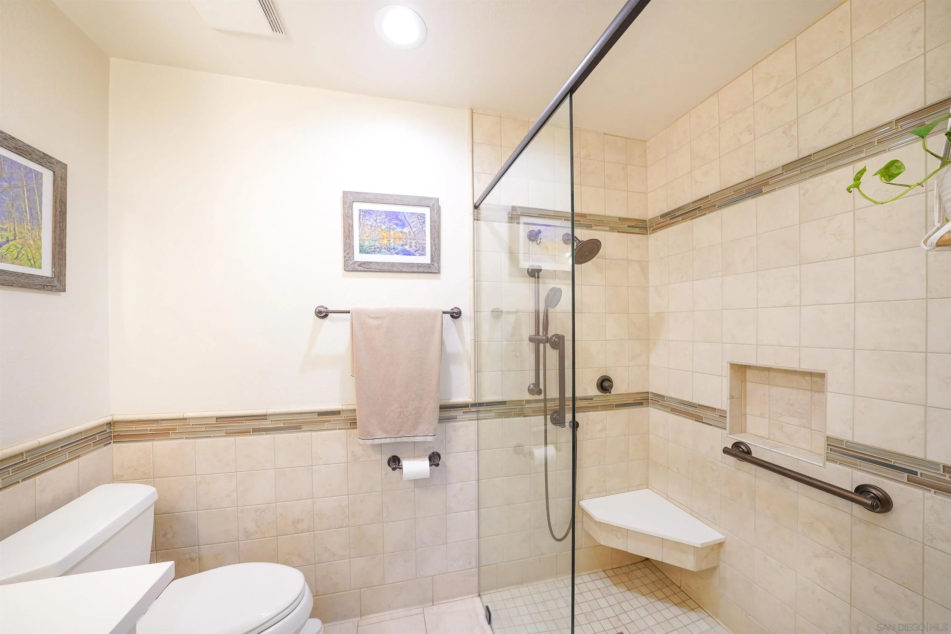 24563 Del Amo Road Ramona, CA 92065 - Photo 36 of 59 a bathroom with a toilet and a shower