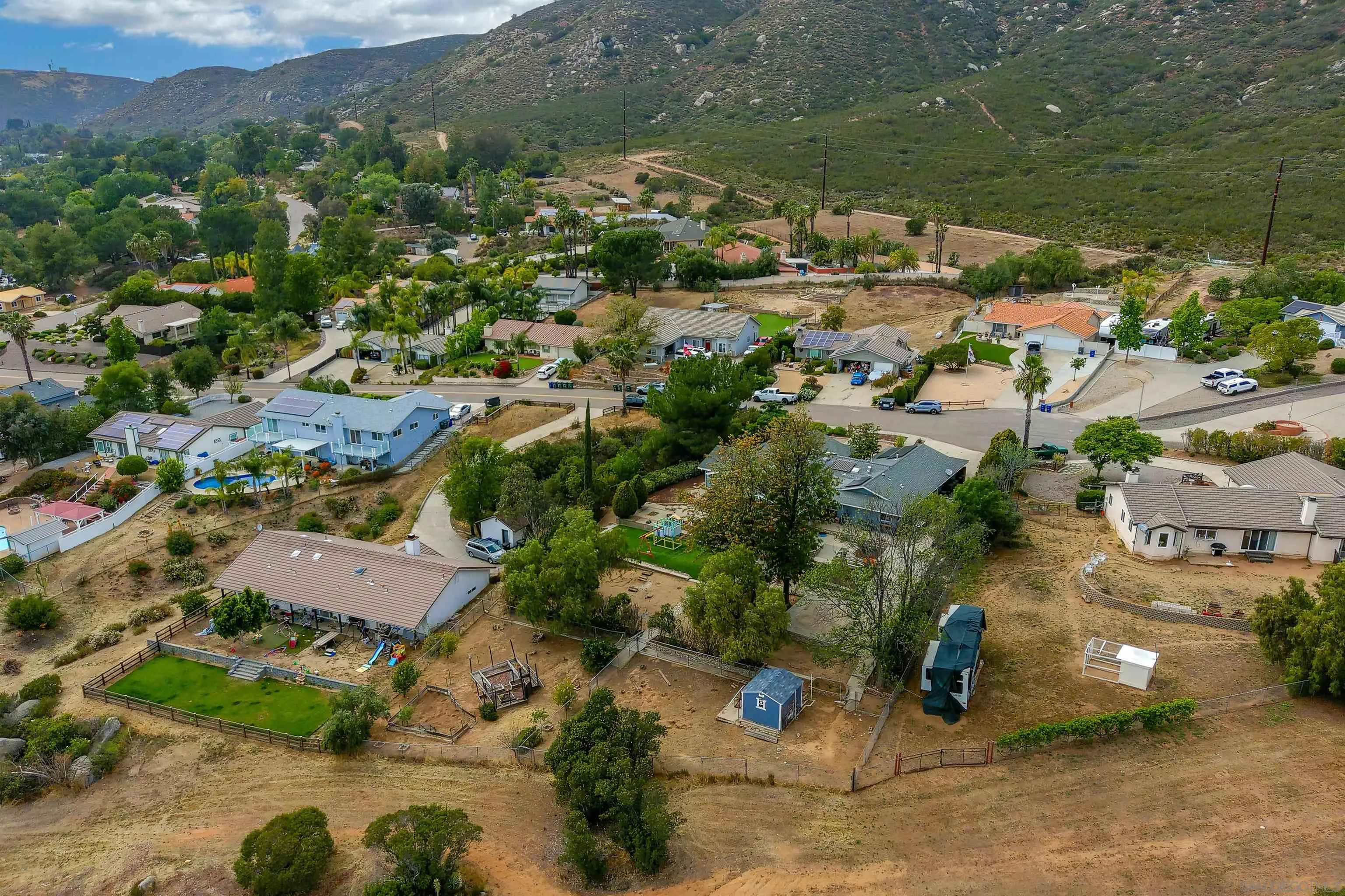 24563 Del Amo Road Ramona, CA 92065 - Photo 44 of 59 an aerial view of residential houses with outdoor space