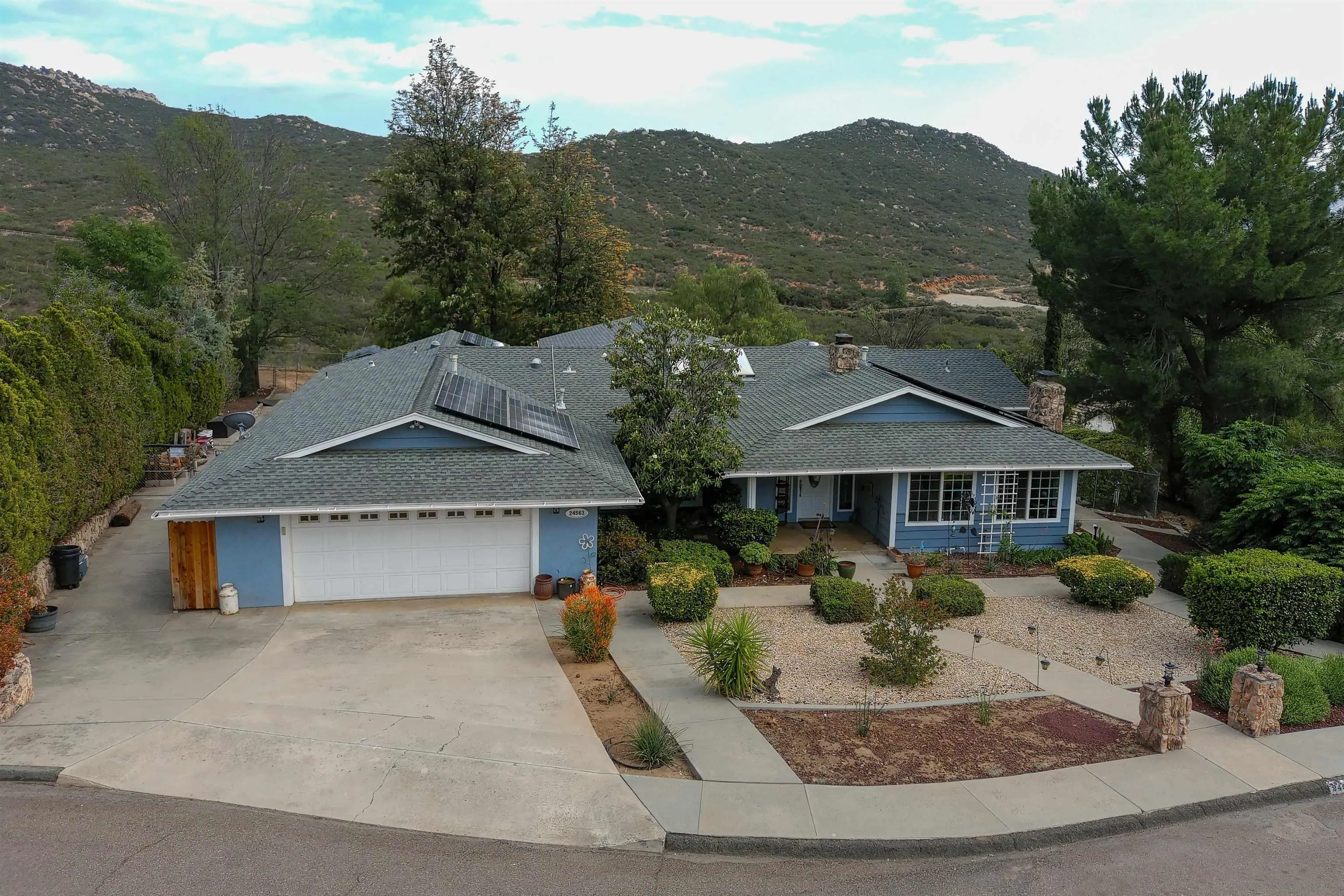 24563 Del Amo Road Ramona, CA 92065 - Photo 46 of 59 front view of a house with a yard