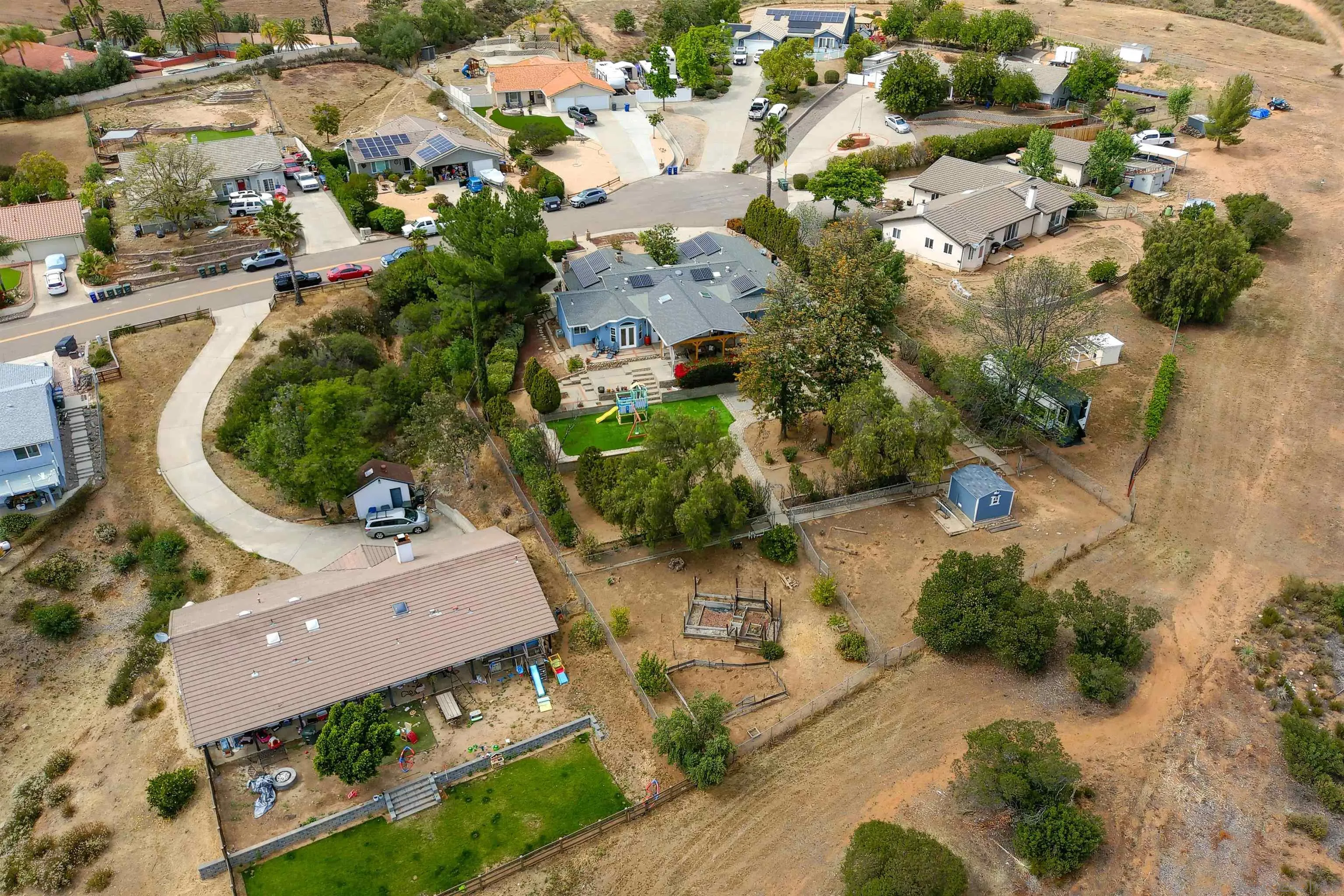 24563 Del Amo Road Ramona, CA 92065 - Photo 59 of 59 an aerial view of a house with a yard and lake view
