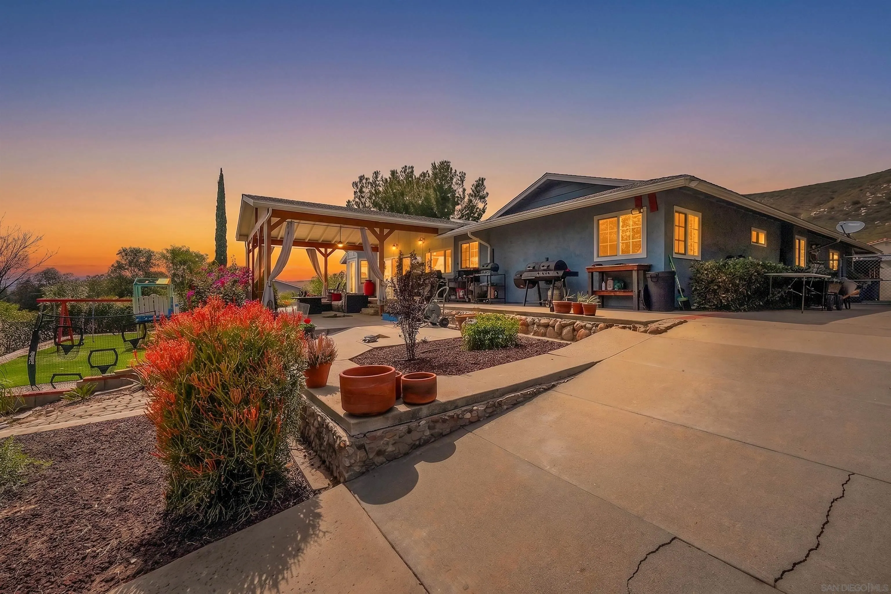 24563 Del Amo Road Ramona, CA 92065 - Photo 6 of 59 a view of a house with a yard