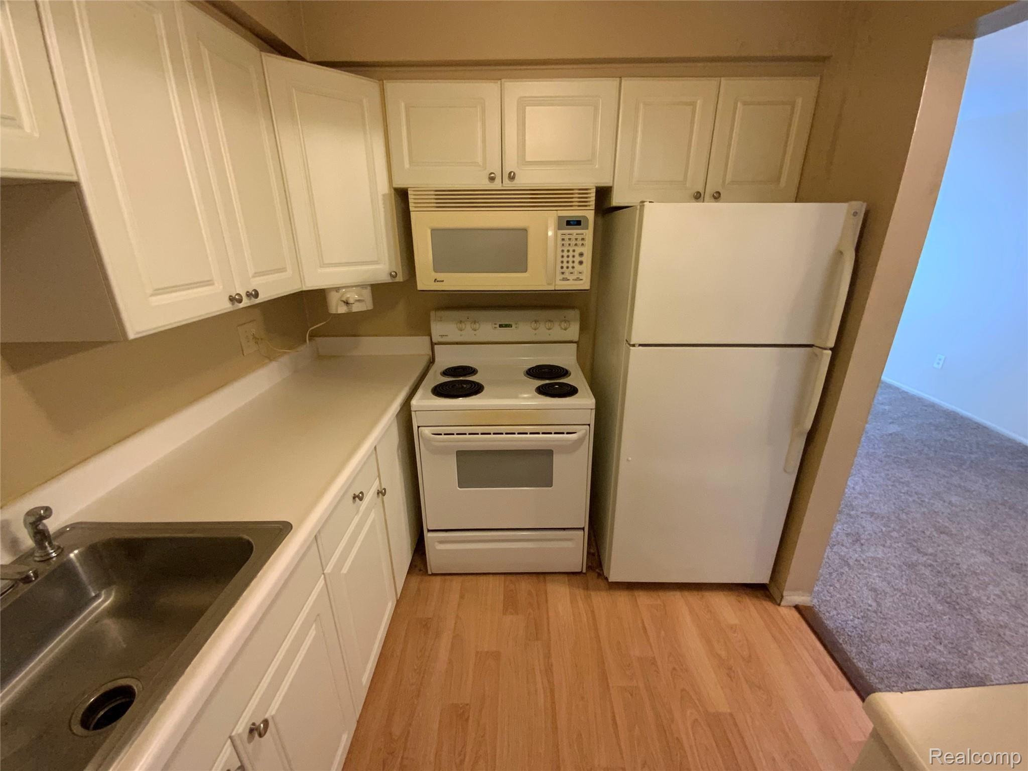 4913 East 10 Mile Road, Unit 52 Warren, MI 48091 - Photo 6 of 22 Photo Aug 20, 4 21 15 PM.jpg