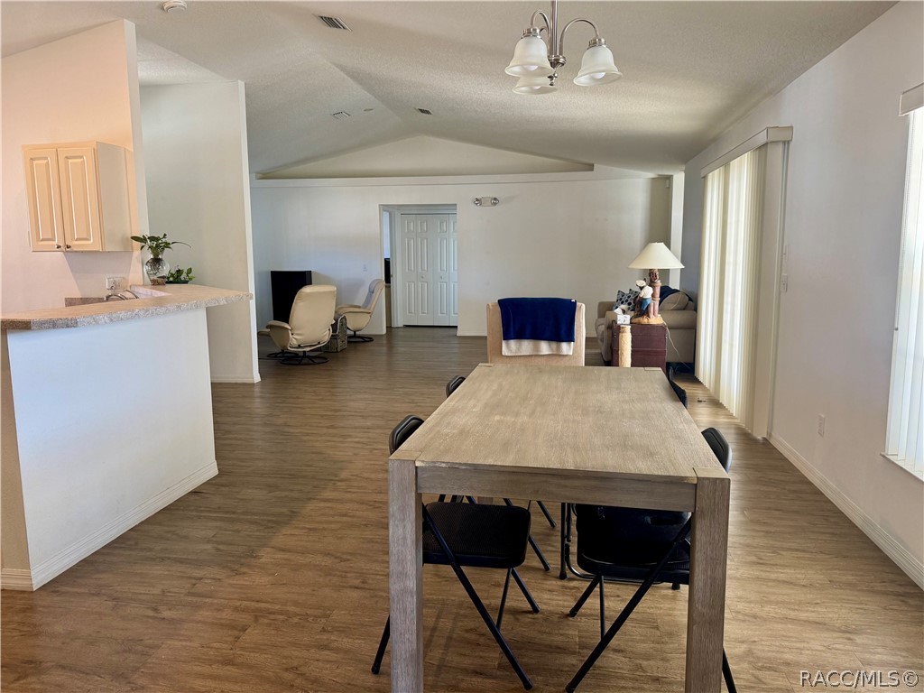 4588 East Van Ness Road Inverness, FL 34453 - Photo 11 of 34 a view of a dining room with furniture