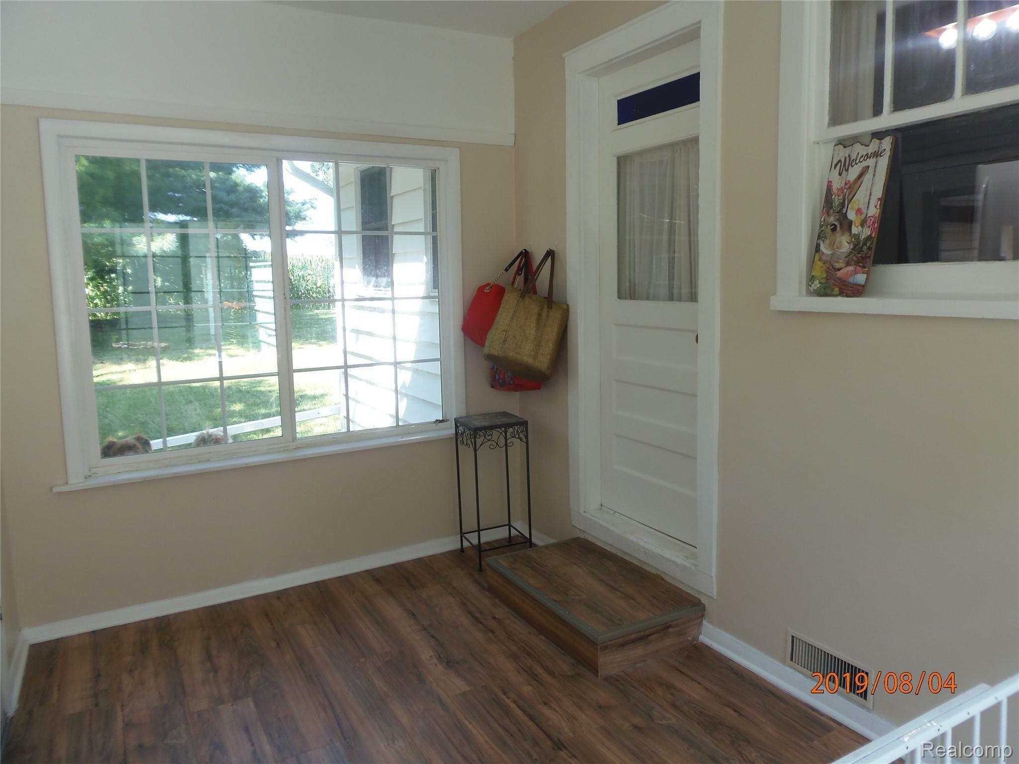 12542 Earl Road Stockbridge, MI 49285 - Photo 13 of 22 sun rm/or mud room