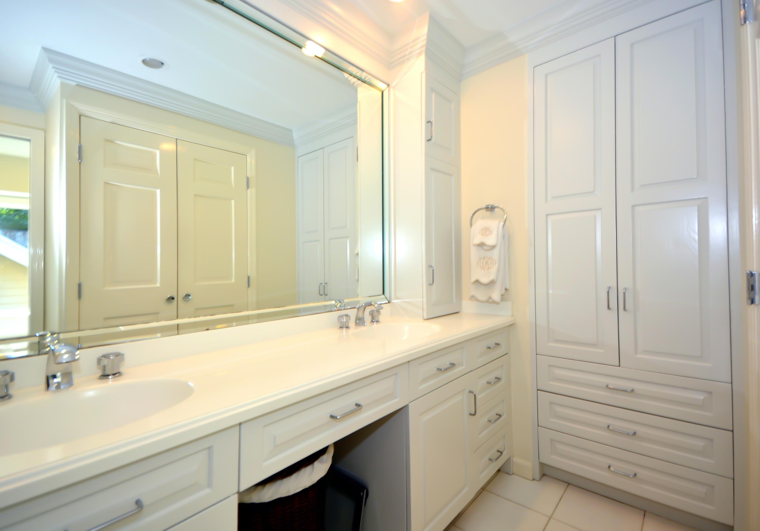 47 Delafield Island Road Darien, CT 06820 - Photo 17 of 26 a bathroom with a sink and a mirror